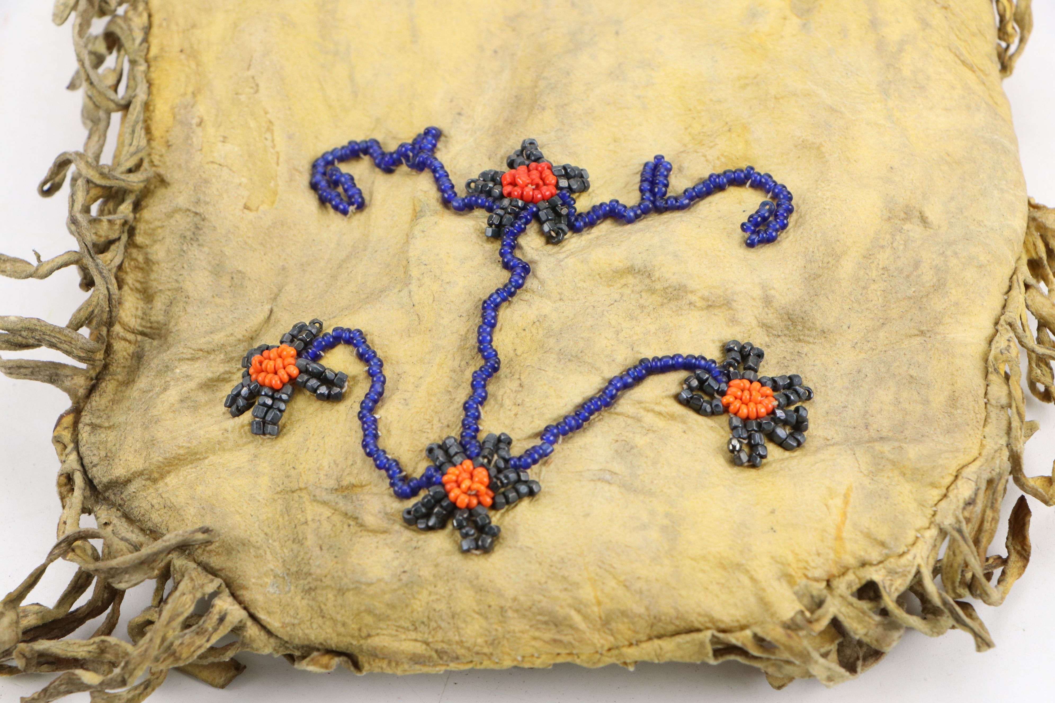 Two Plains Style Beaded "Fetishes" with Indigenous Woodlands Beaded Hide Pouch