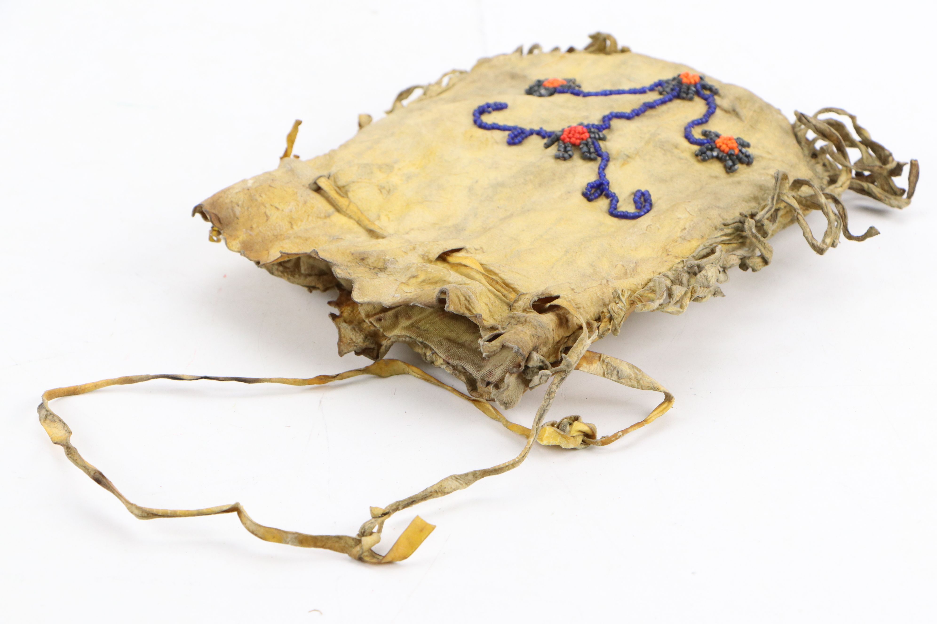 Two Plains Style Beaded "Fetishes" with Indigenous Woodlands Beaded Hide Pouch