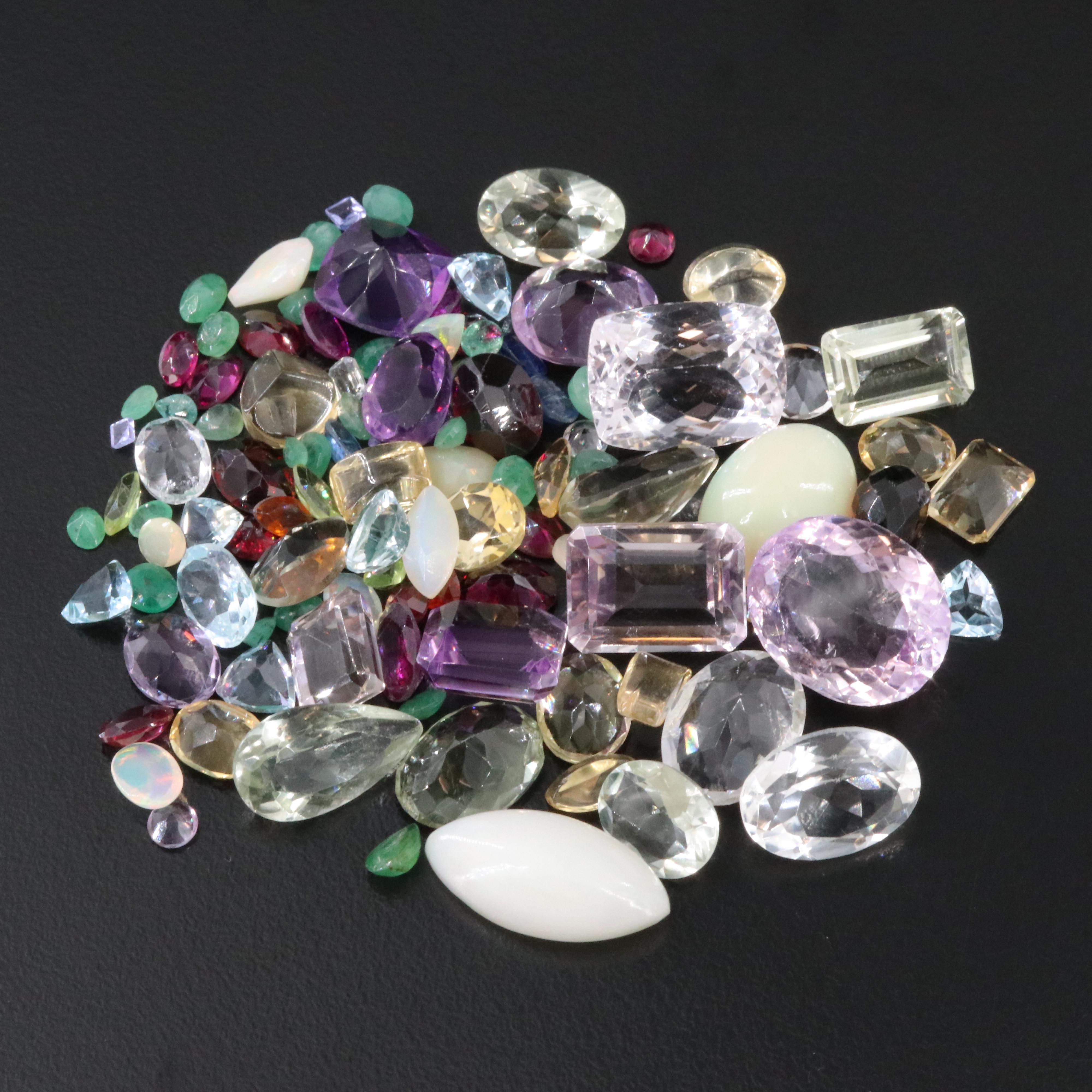 Loose 149.24 CTW Gemstone Lot Including Amethyst, Emerald and Garnet