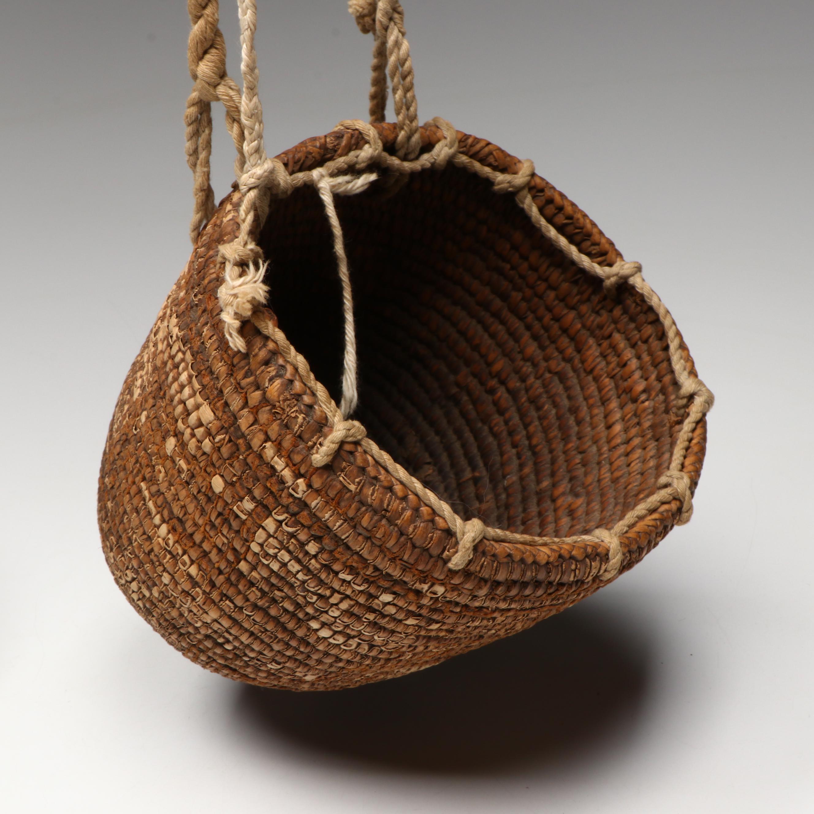 Two Pacific Northwest Utilitarian "Clam" Baskets, 20th Century