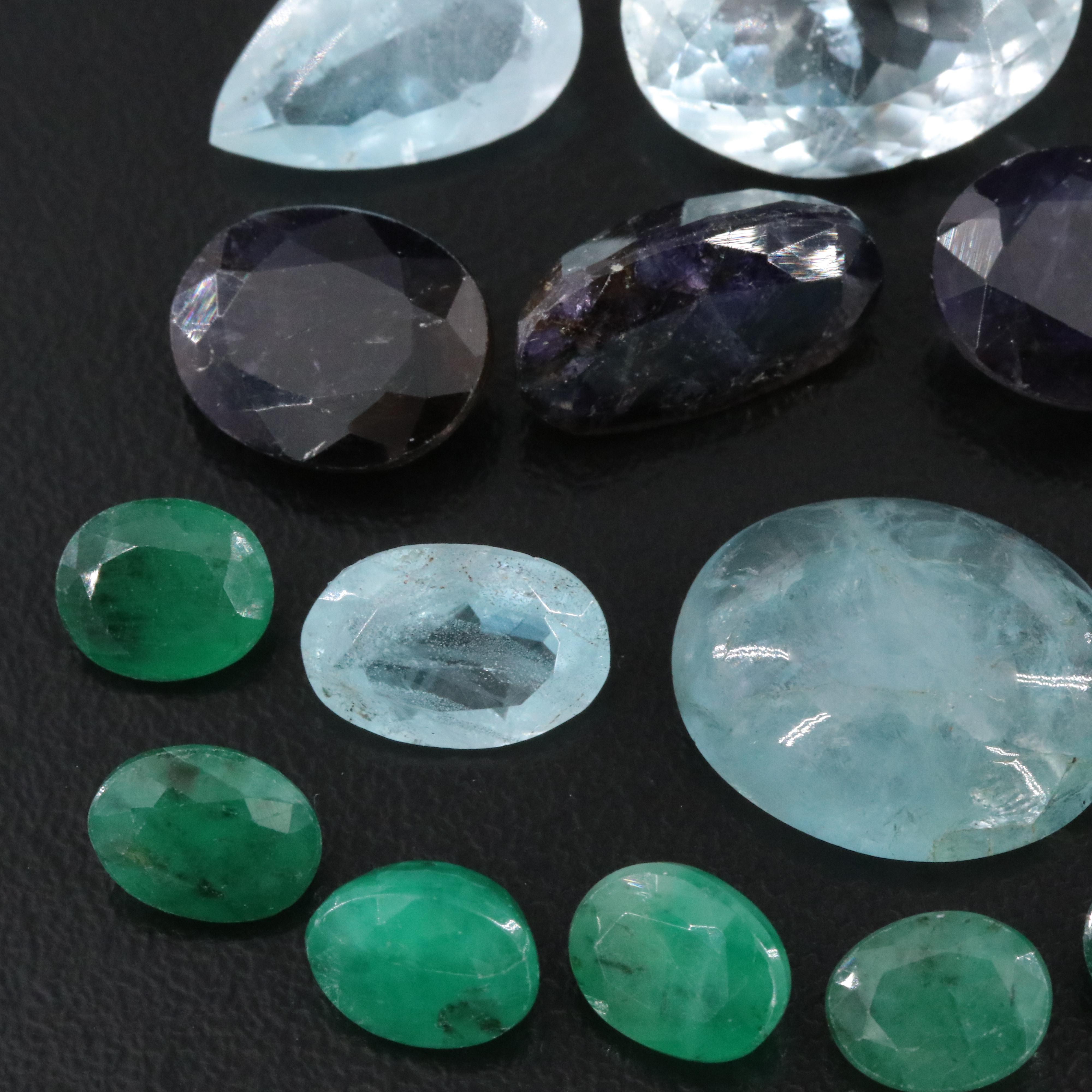 Loose 68.57 CTW Gemstone Lot Including Topaz, Emerald and Iolite