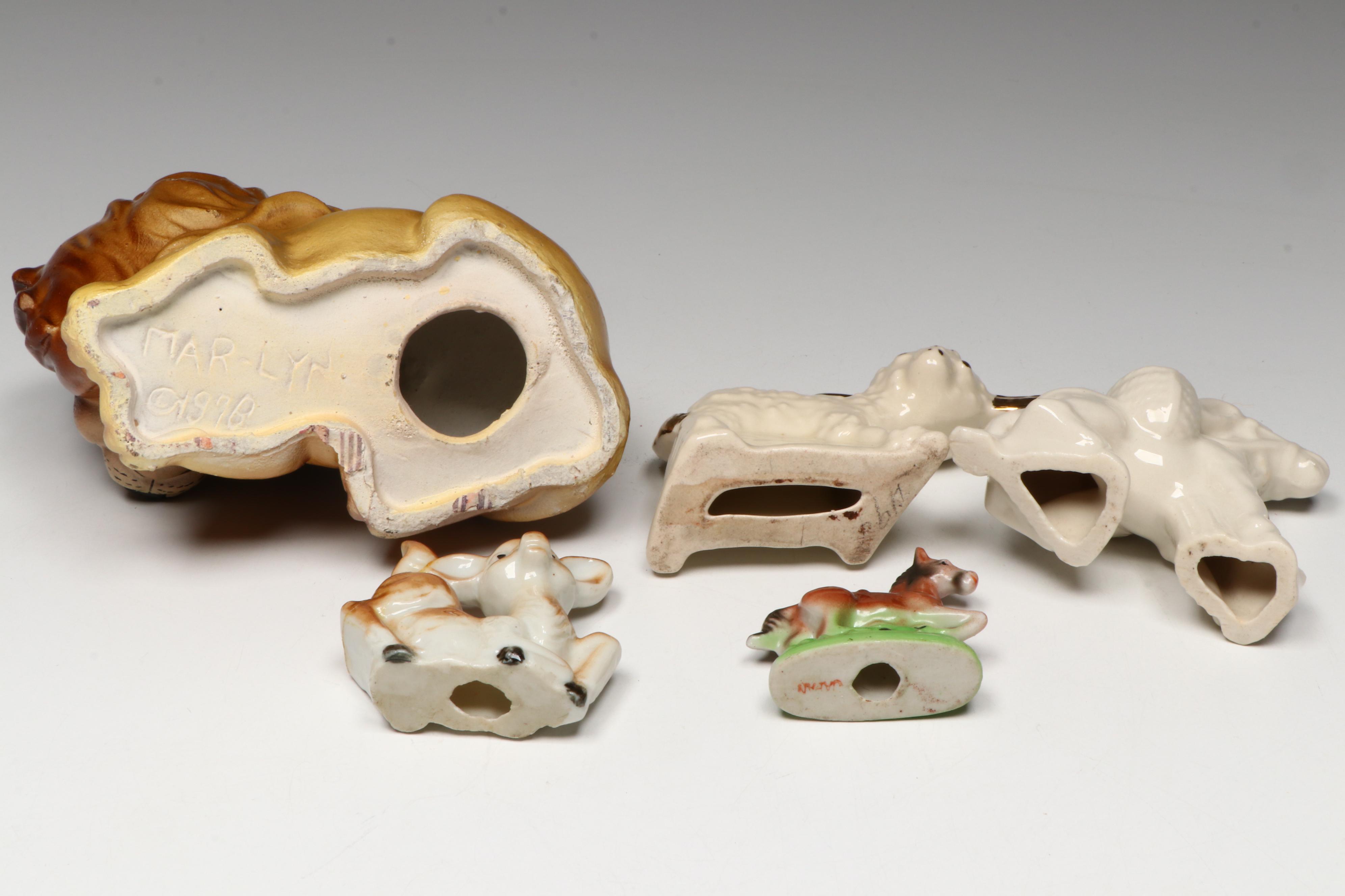 Japanese Tanuki Mug with Ceramic and Other Figurines