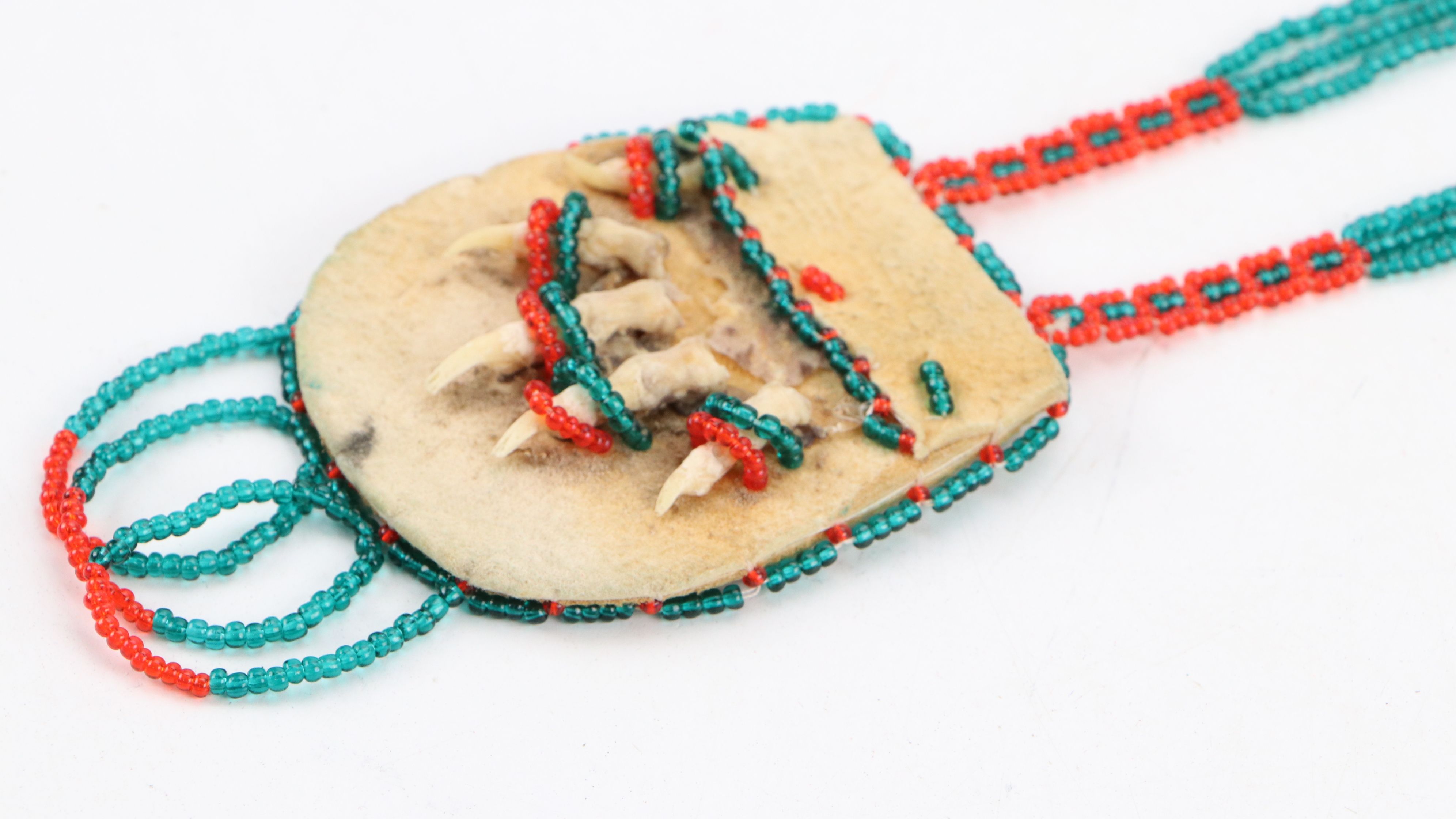 Indigenous American Hand-Beaded Pouches and Floral Beadwork Panels