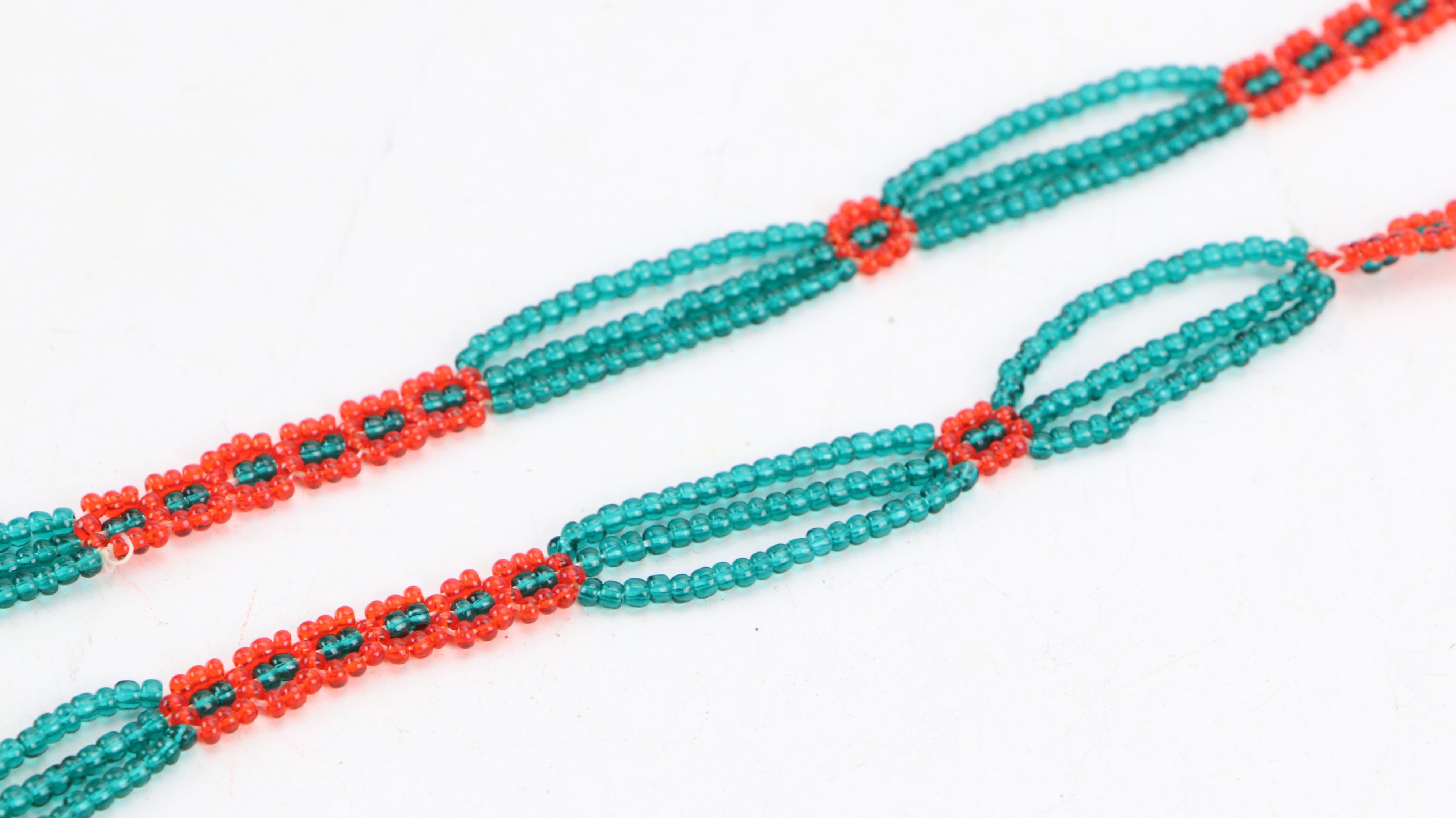 Indigenous American Hand-Beaded Pouches and Floral Beadwork Panels