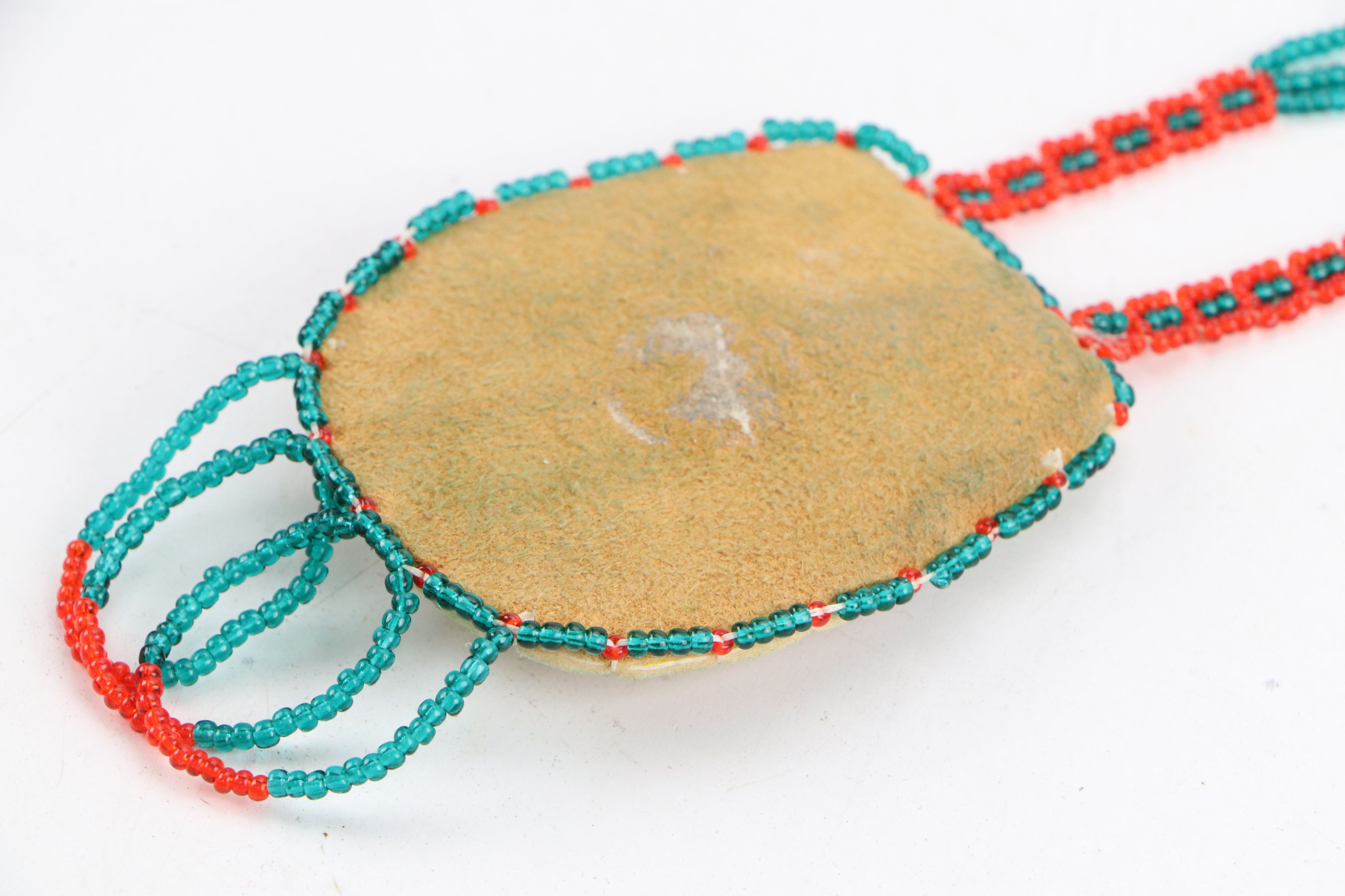 Indigenous American Hand-Beaded Pouches and Floral Beadwork Panels