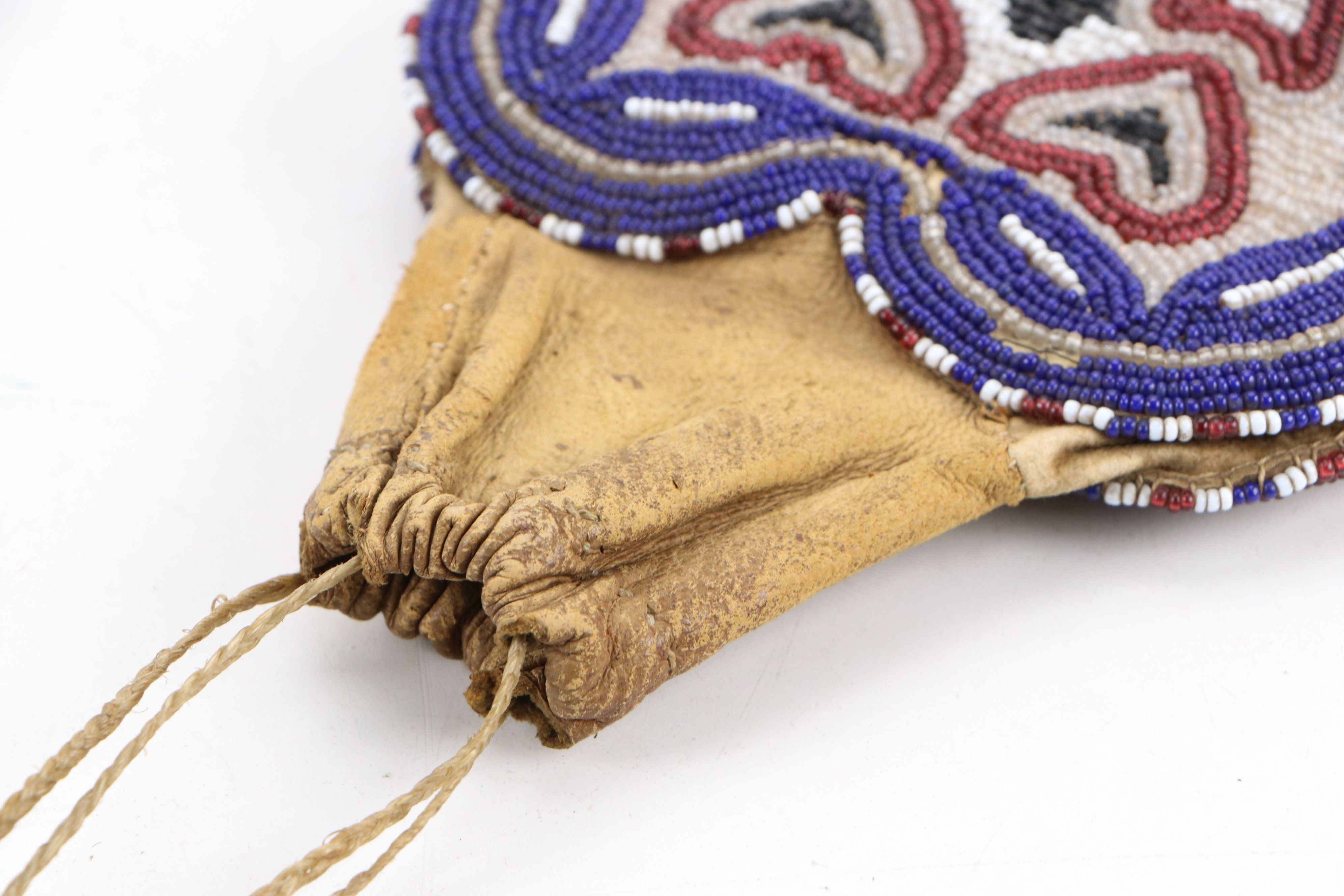 Indigenous American Hand-Beaded Pouches and Floral Beadwork Panels