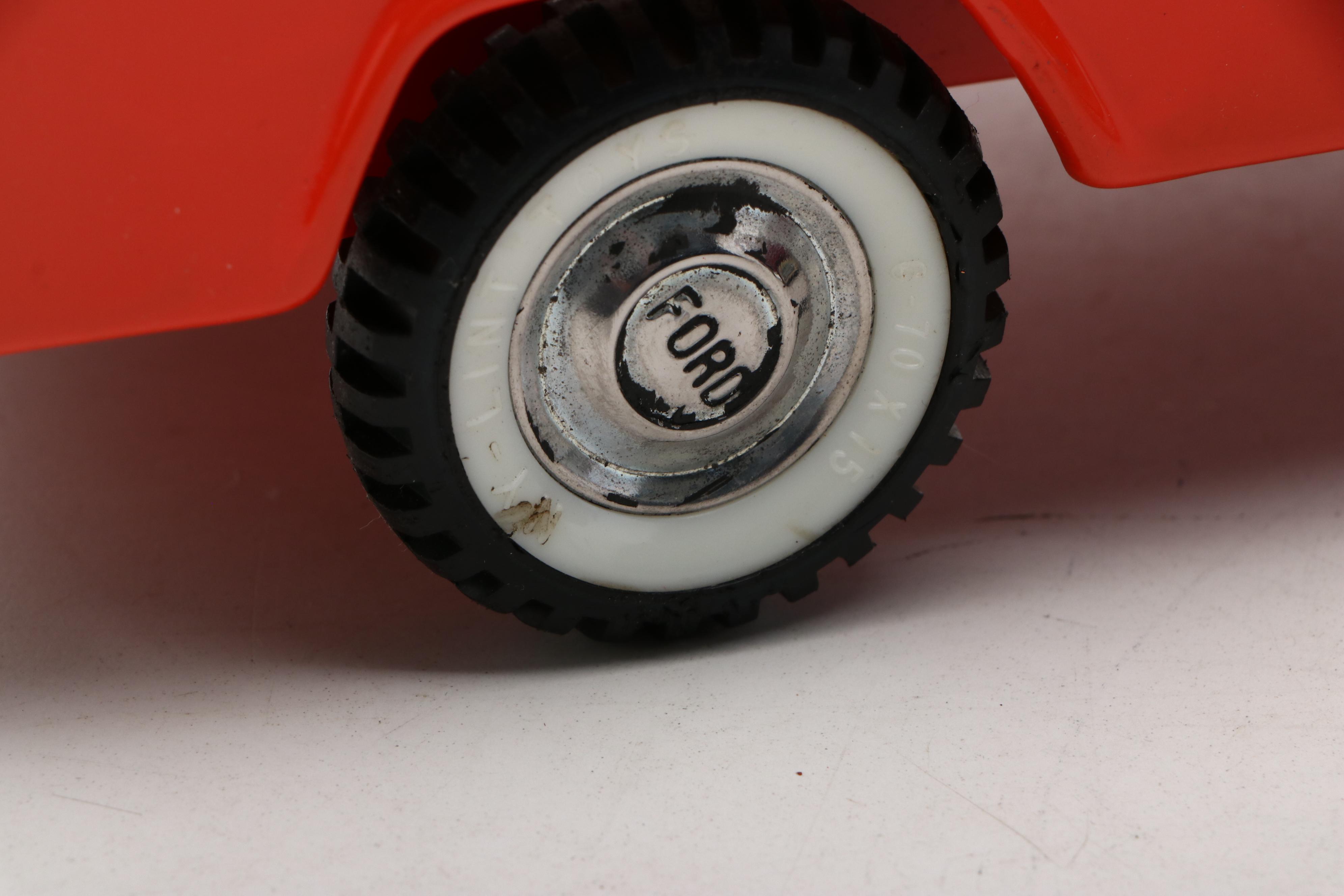 Nylint Pressed Steel Ford "Case" and "HI" Trucks, Mid-20th Century