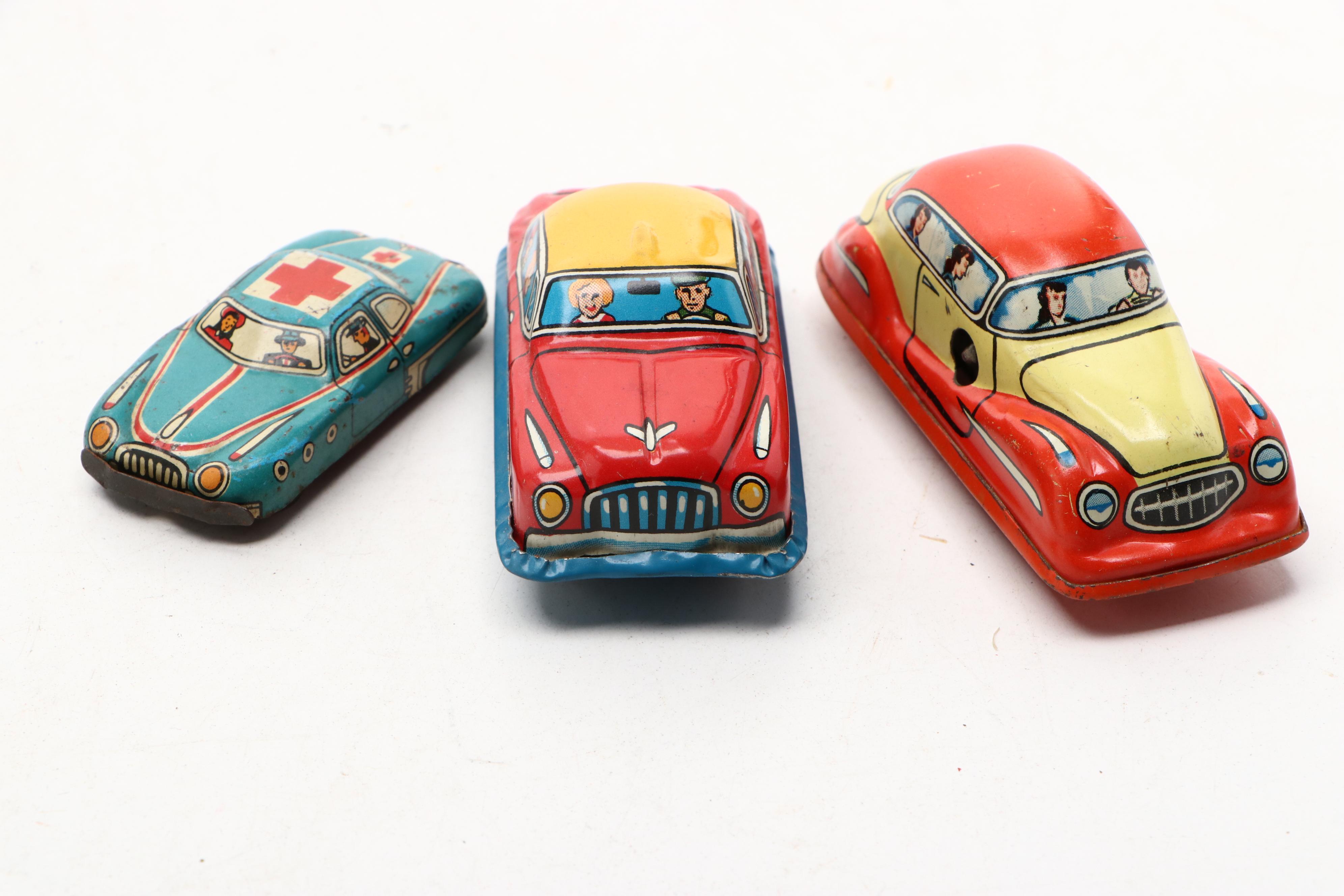 Vintage Toy Greyhound Bus with More Japanese and German Toy Cars and Trucks