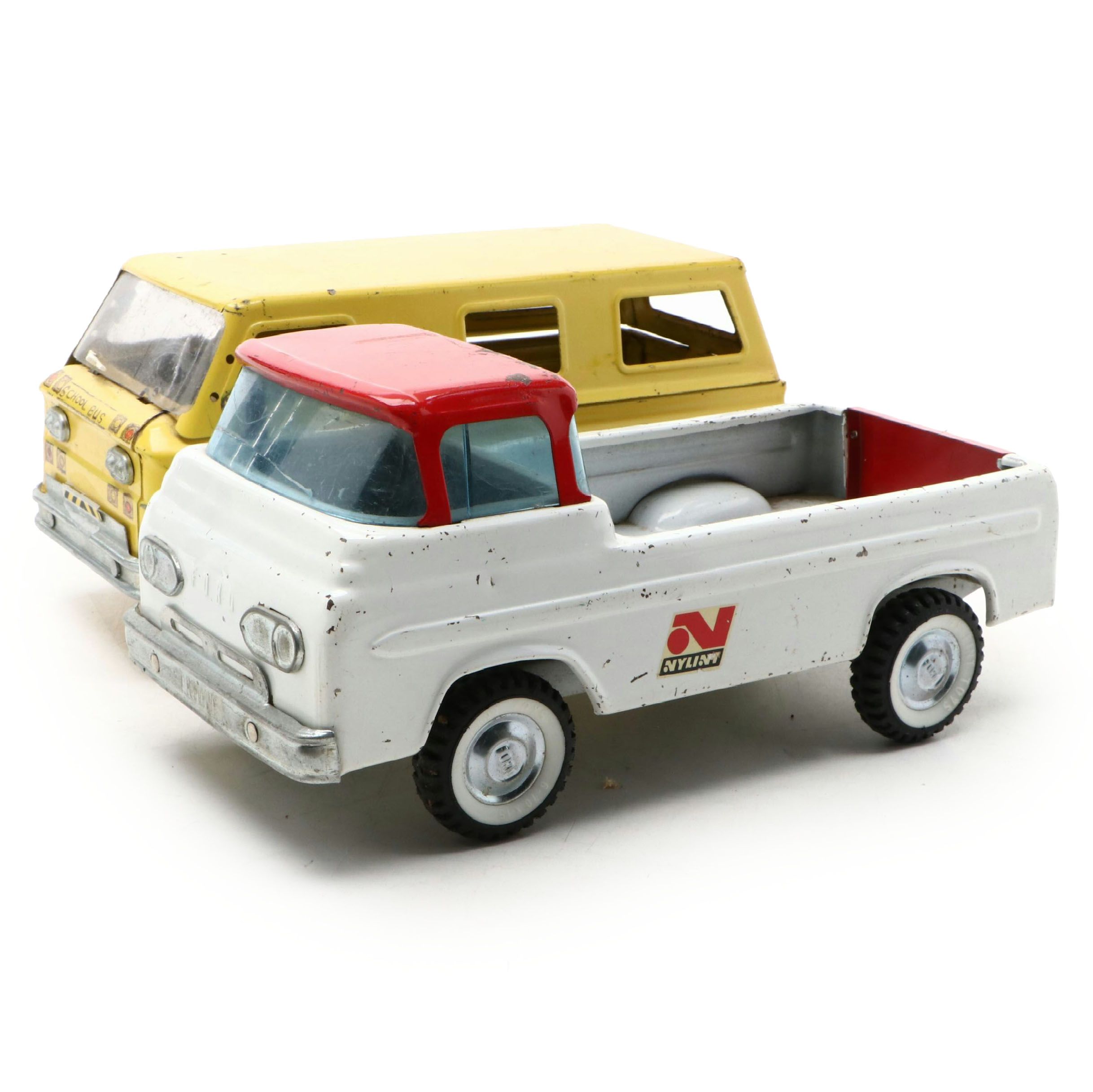 Nylint Pressed Steel Ford Econoline Truck with Structo School Bus
