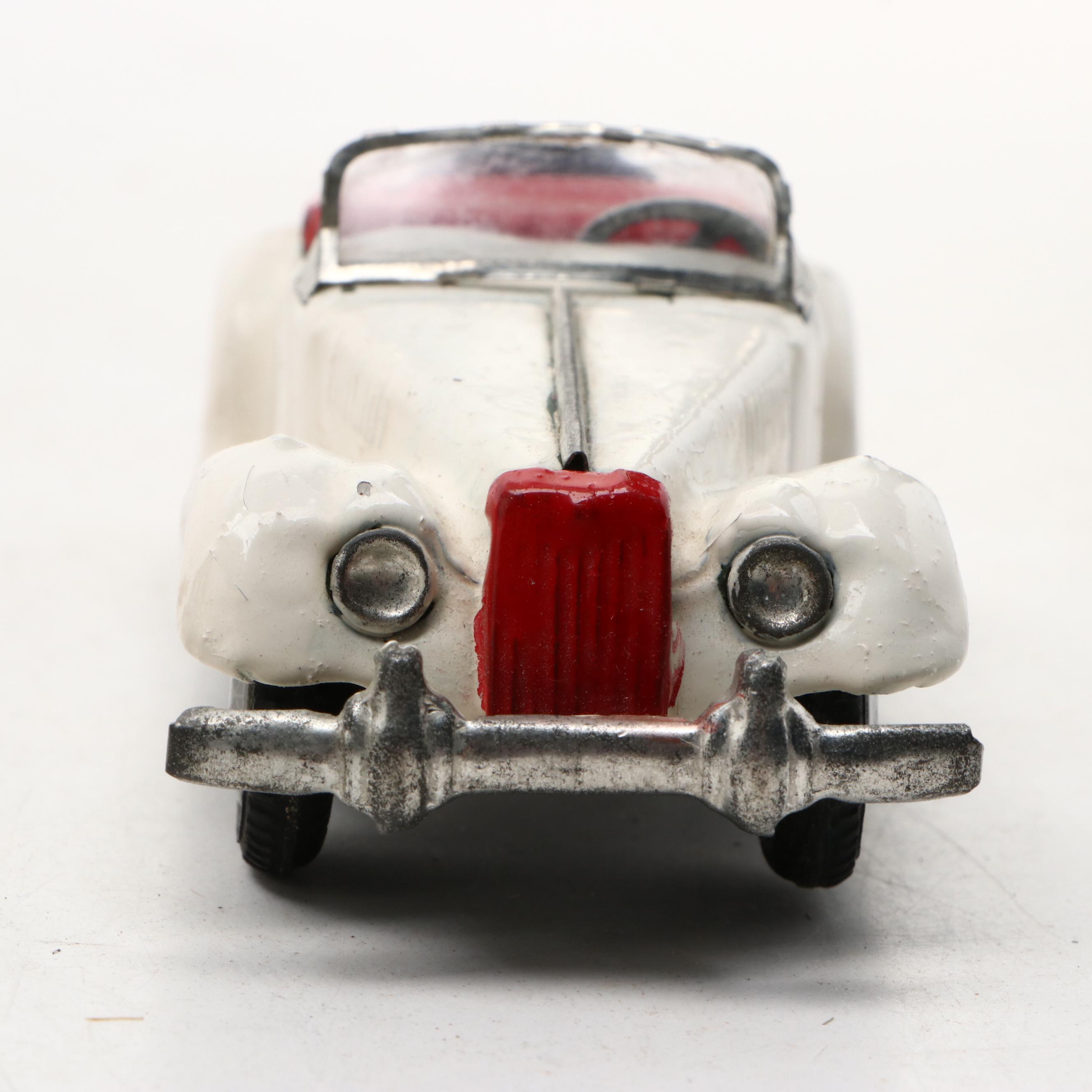 Studebaker Tin Wind-Up Car with More Vintage Toy Cars and Boat