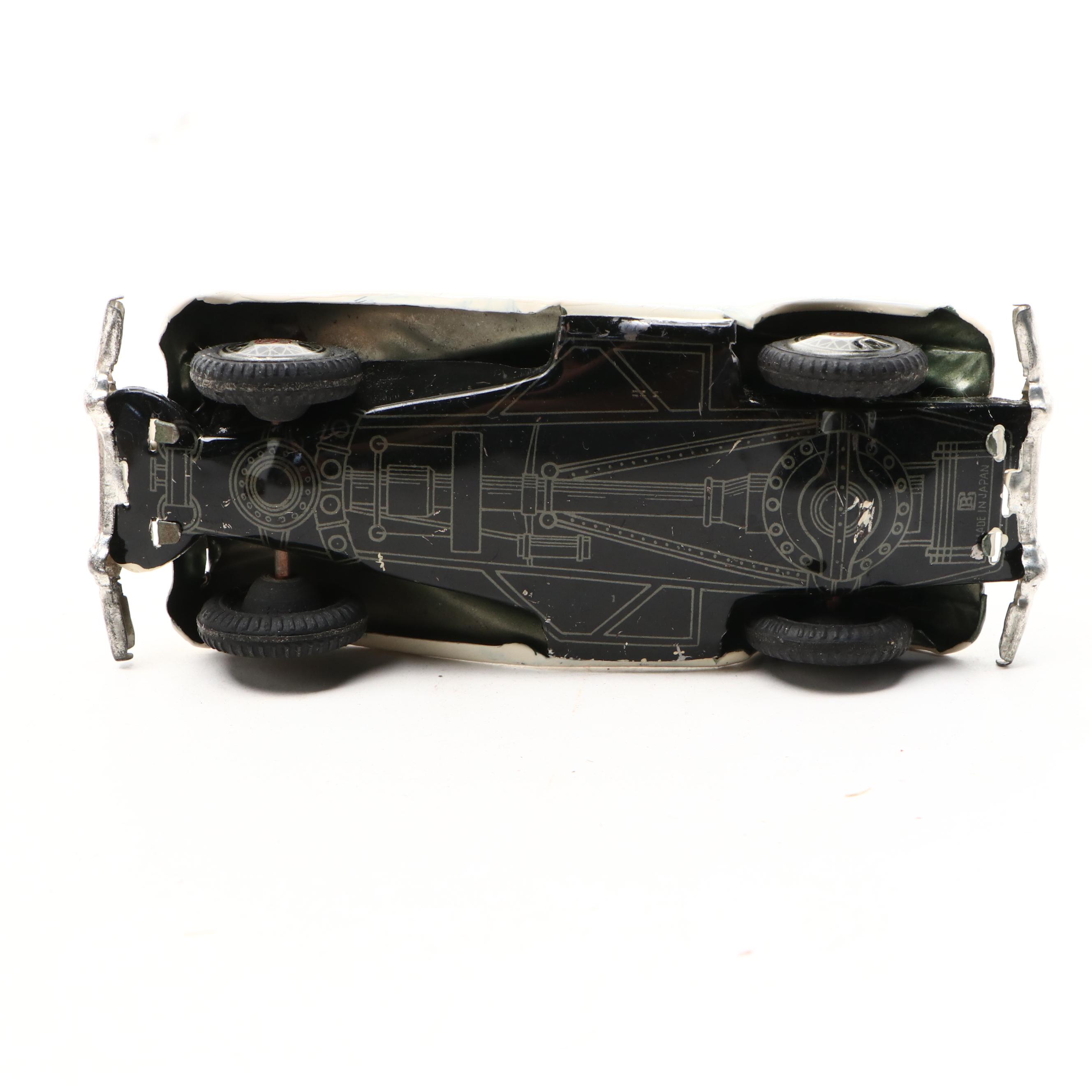 Studebaker Tin Wind-Up Car with More Vintage Toy Cars and Boat