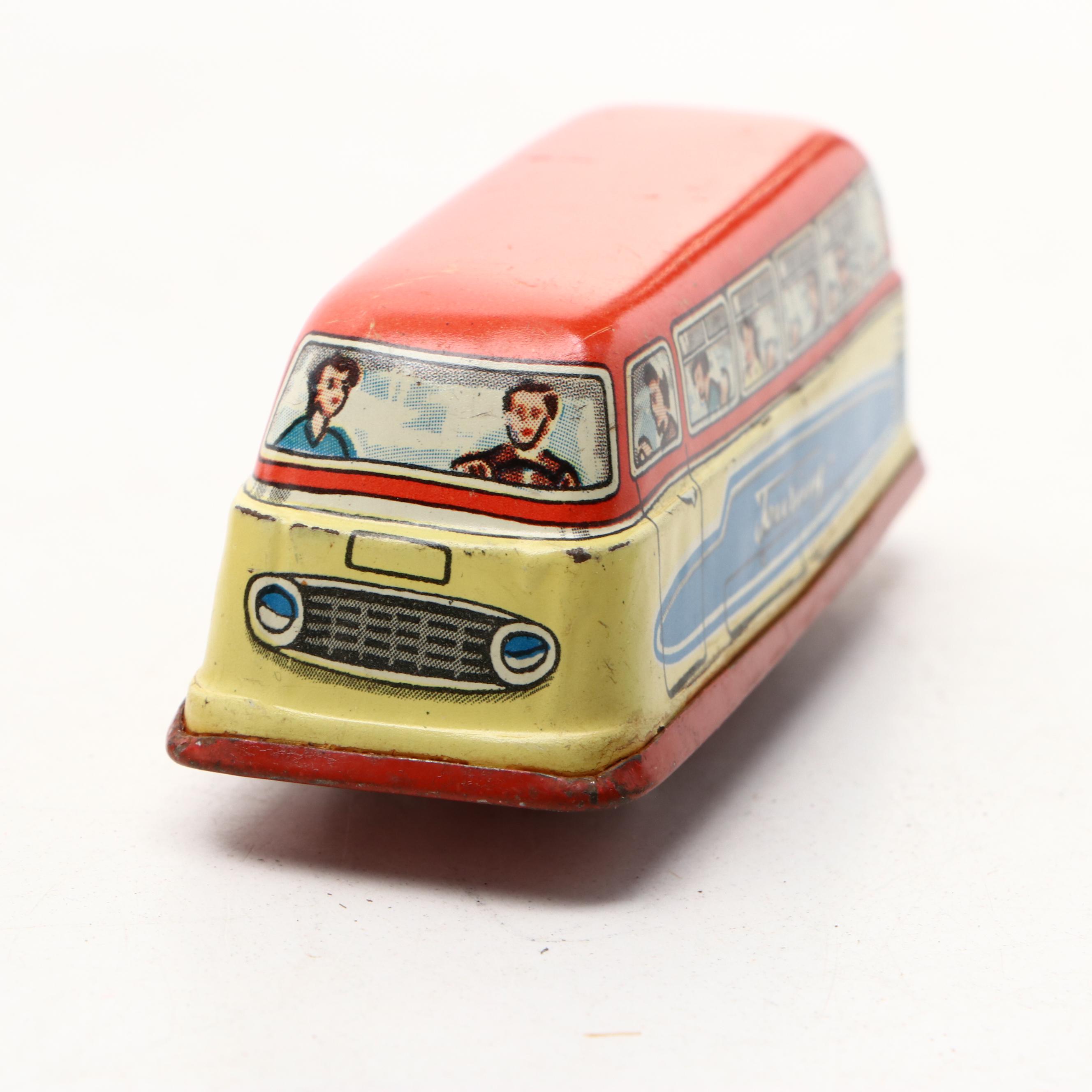 Studebaker Tin Wind-Up Car with More Vintage Toy Cars and Boat