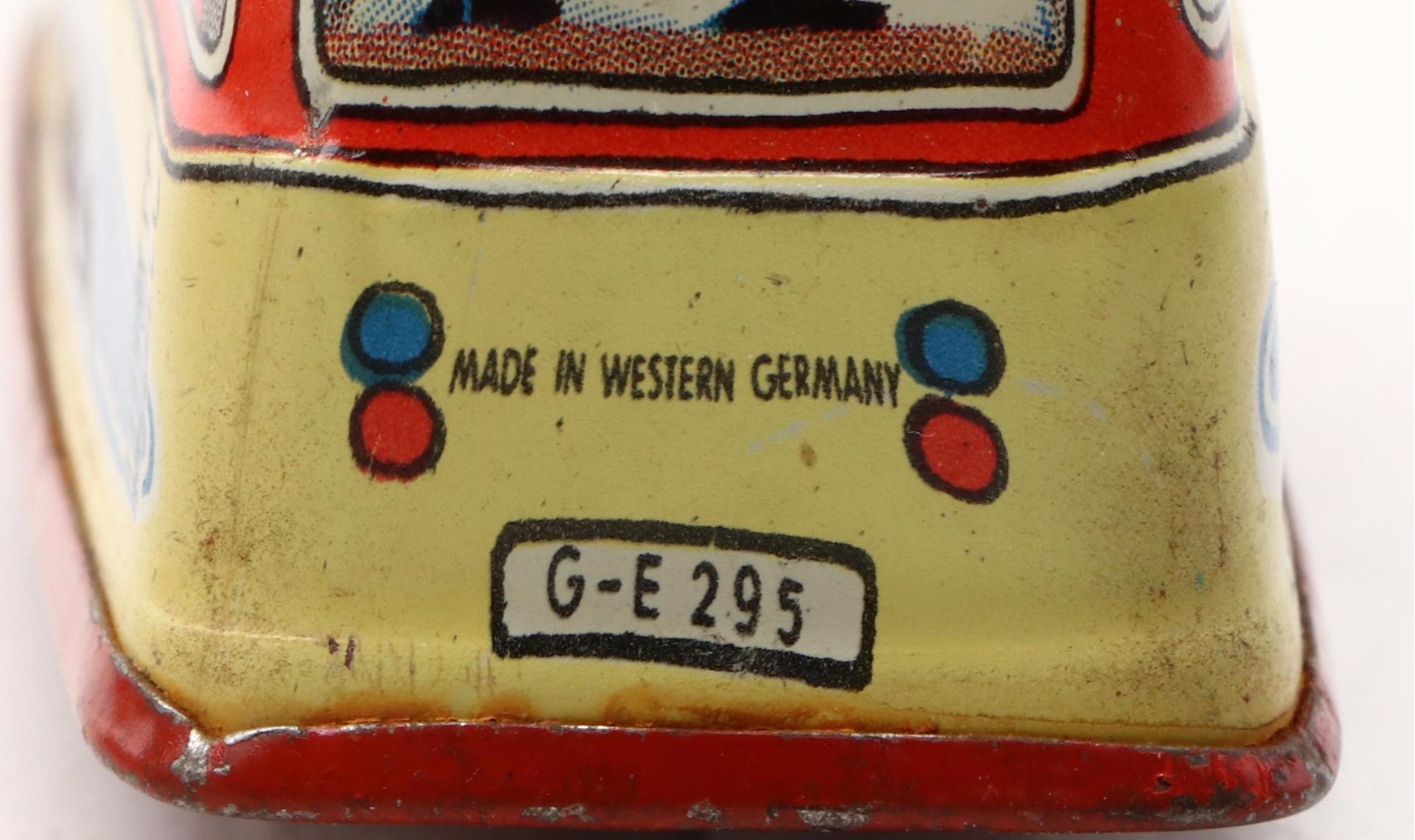 Studebaker Tin Wind-Up Car with More Vintage Toy Cars and Boat