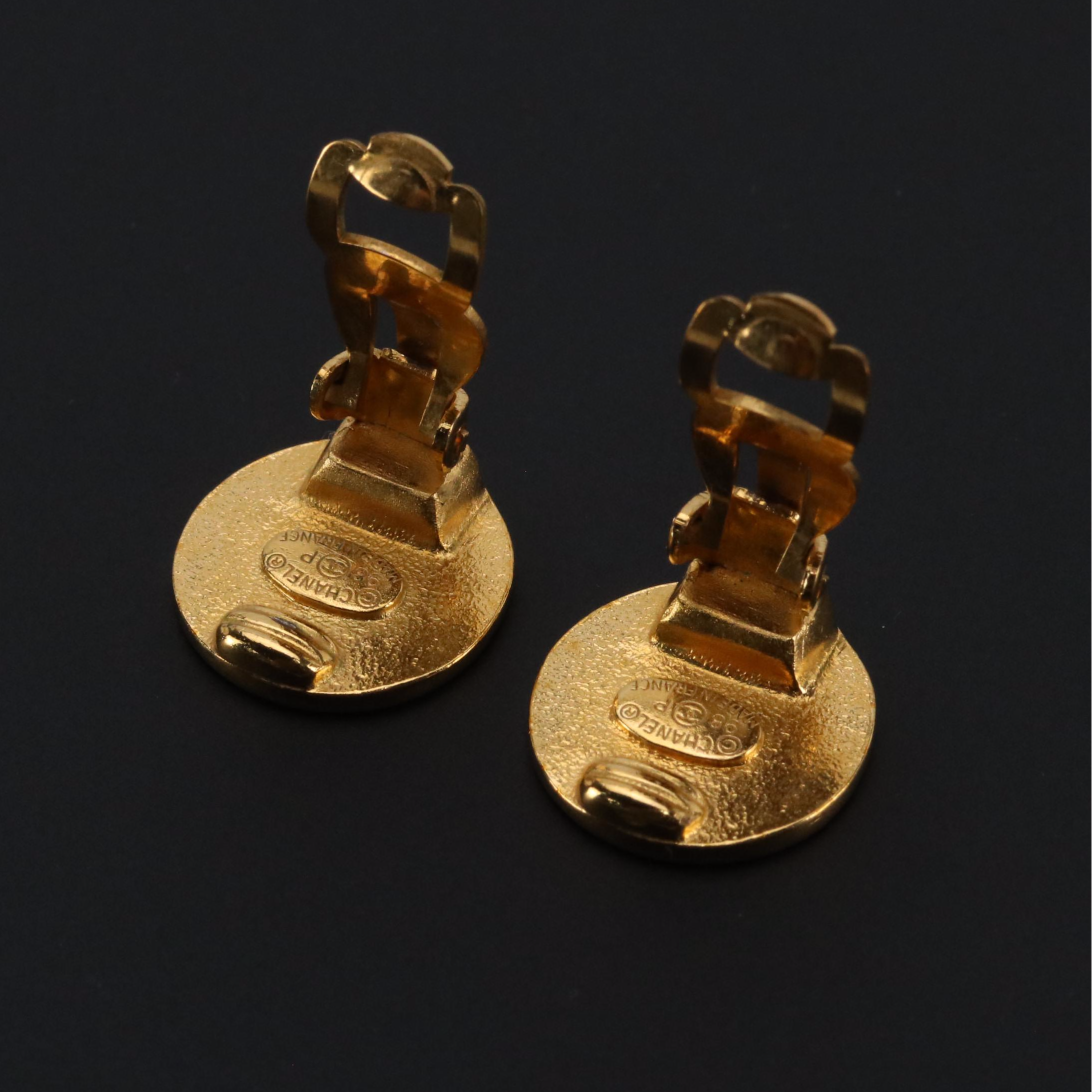 Chanel Gold Tone Logo Button Clip Earrings