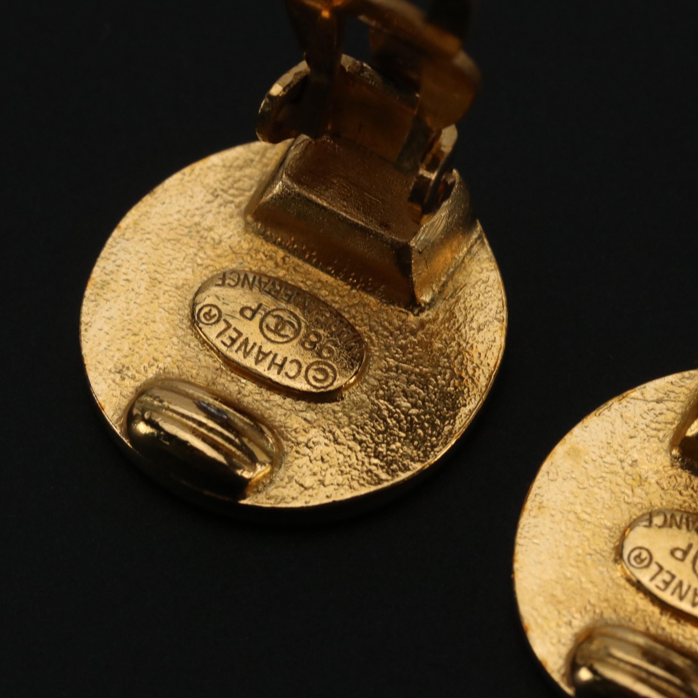 Chanel Gold Tone Logo Button Clip Earrings