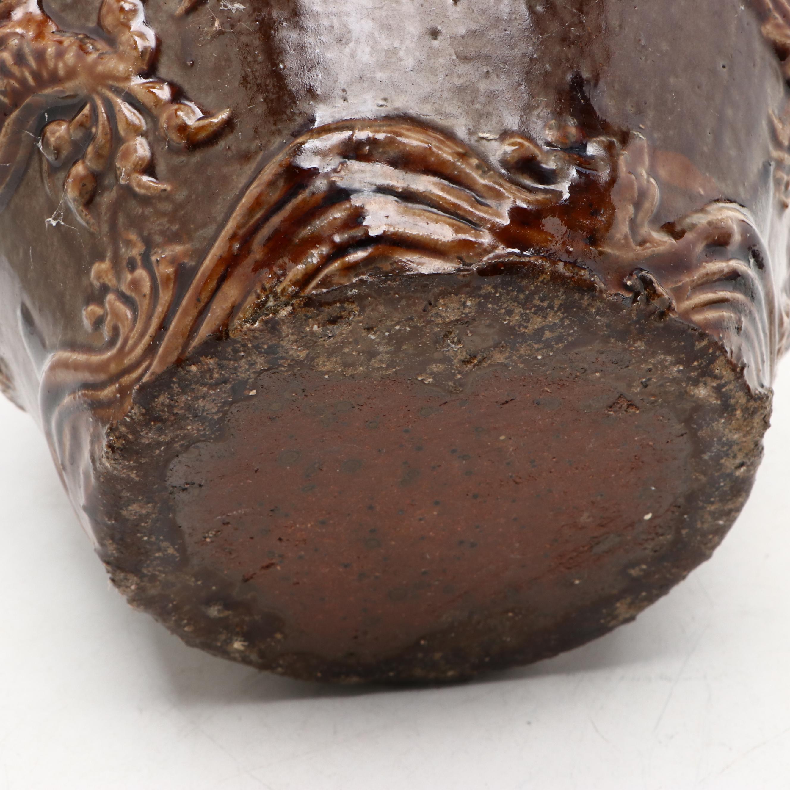 Chinese Brown Glazed Earthenware Dragon Jardinière with Carved Hardwood Stand