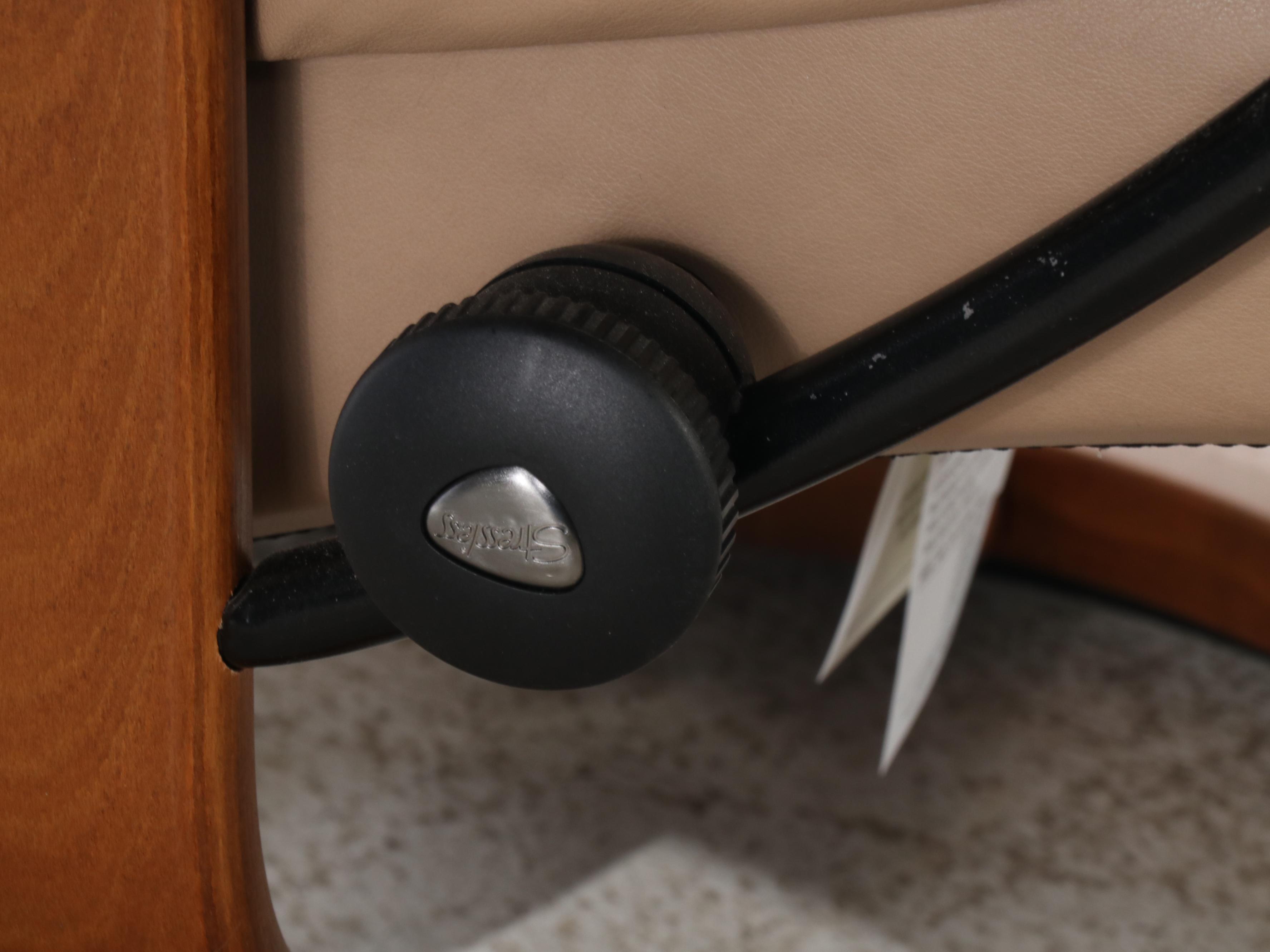 Ekornes "Stressless" Leather Upholstered Recliner and Footstool