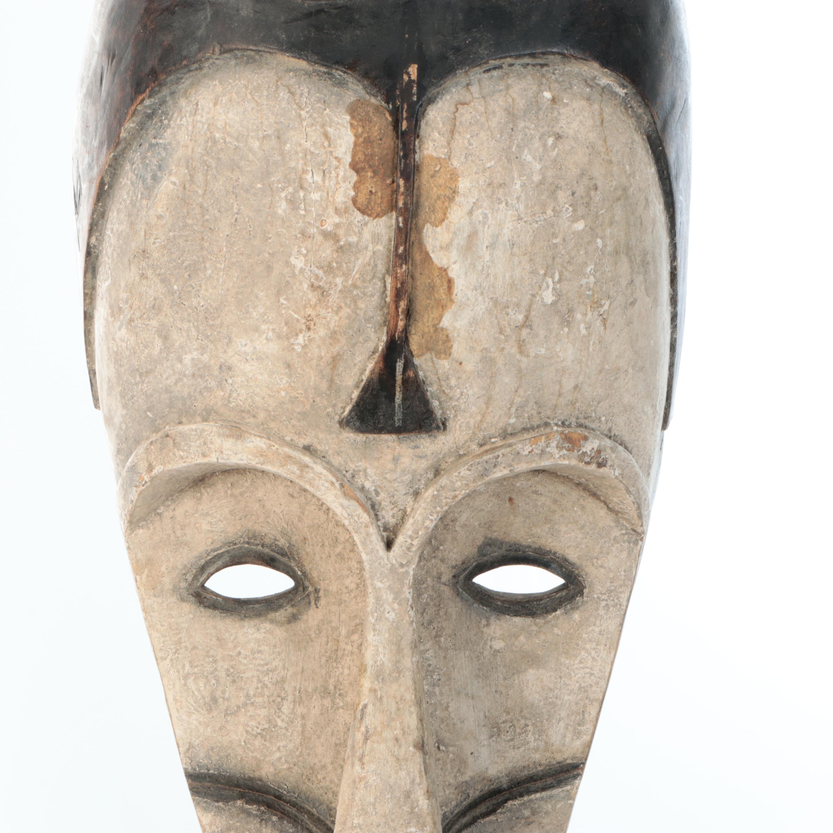 Fang Peoples "Ngil" Wood Mask on Base, 20th Century