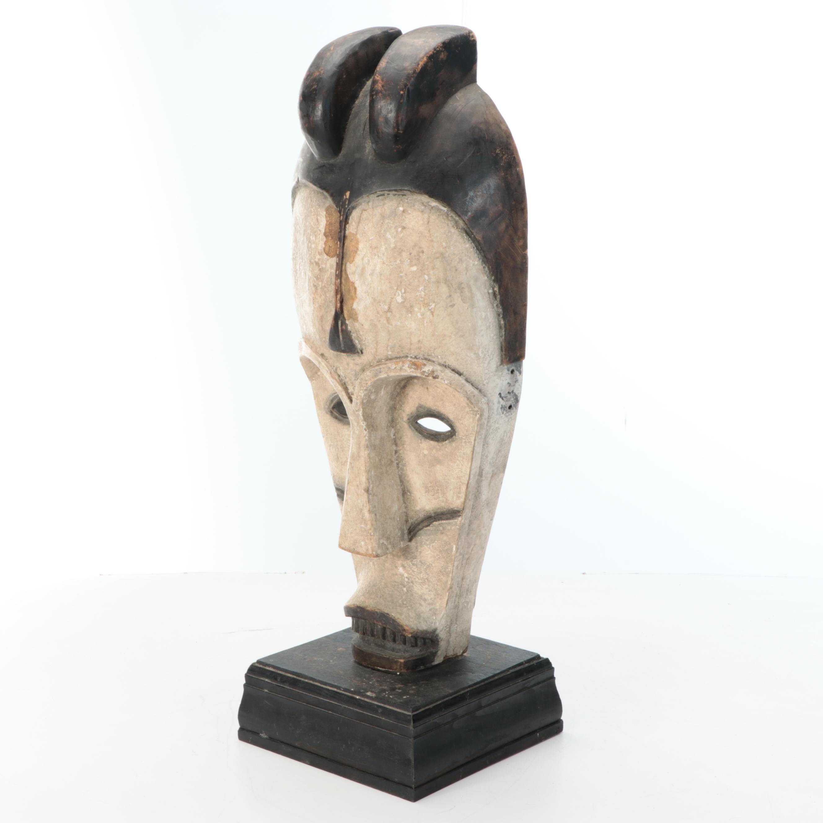 Fang Peoples "Ngil" Wood Mask on Base, 20th Century