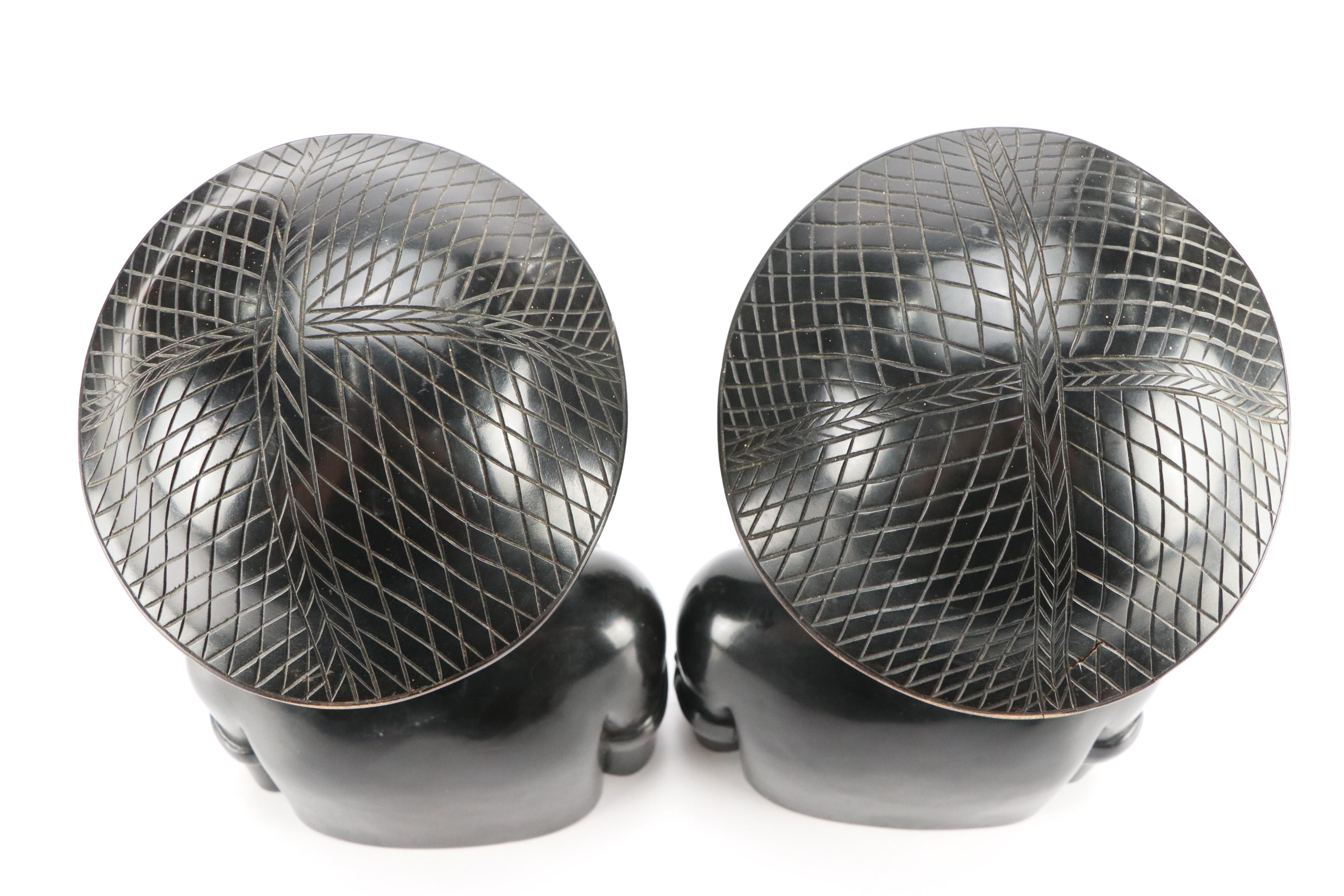 Philippine Igorot Ebonized Carved Male and Female Busts, Mid-20th Century