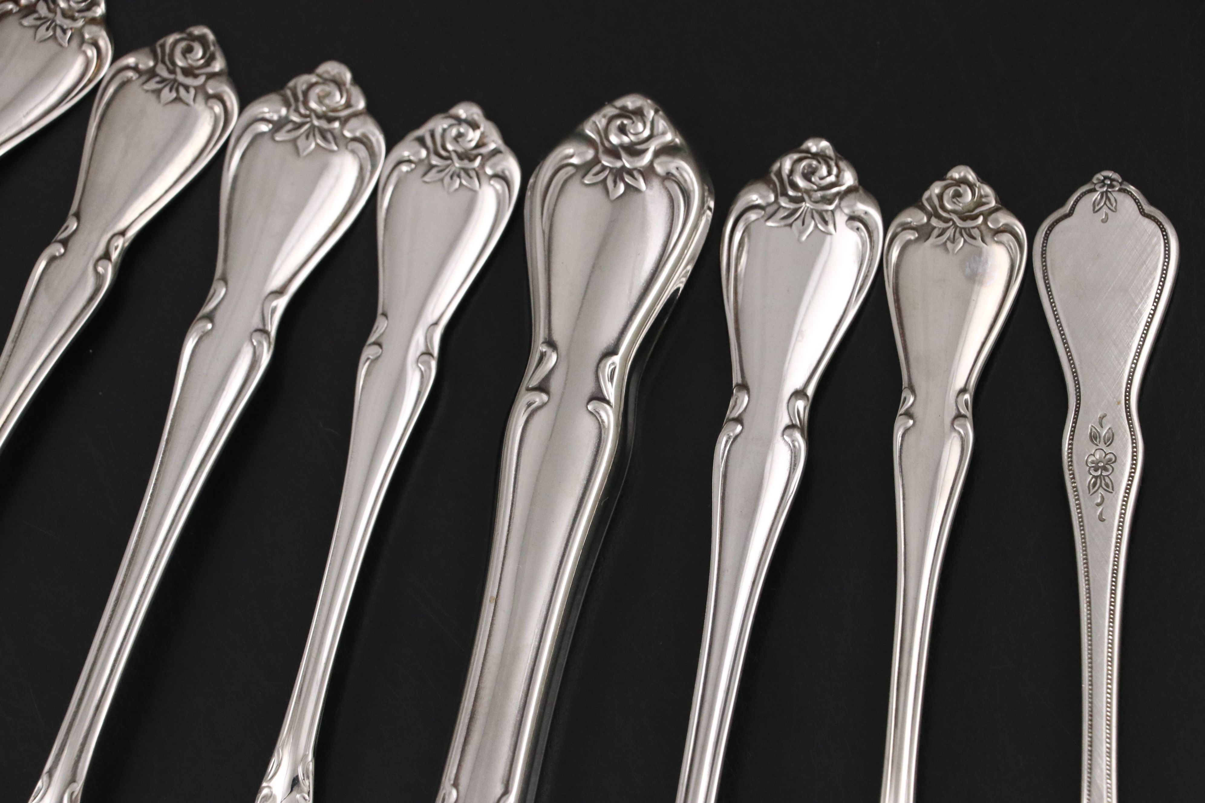 Oneida "Arbor Rose-True Rose" Stainless Steel Flatware, Late 20th Century