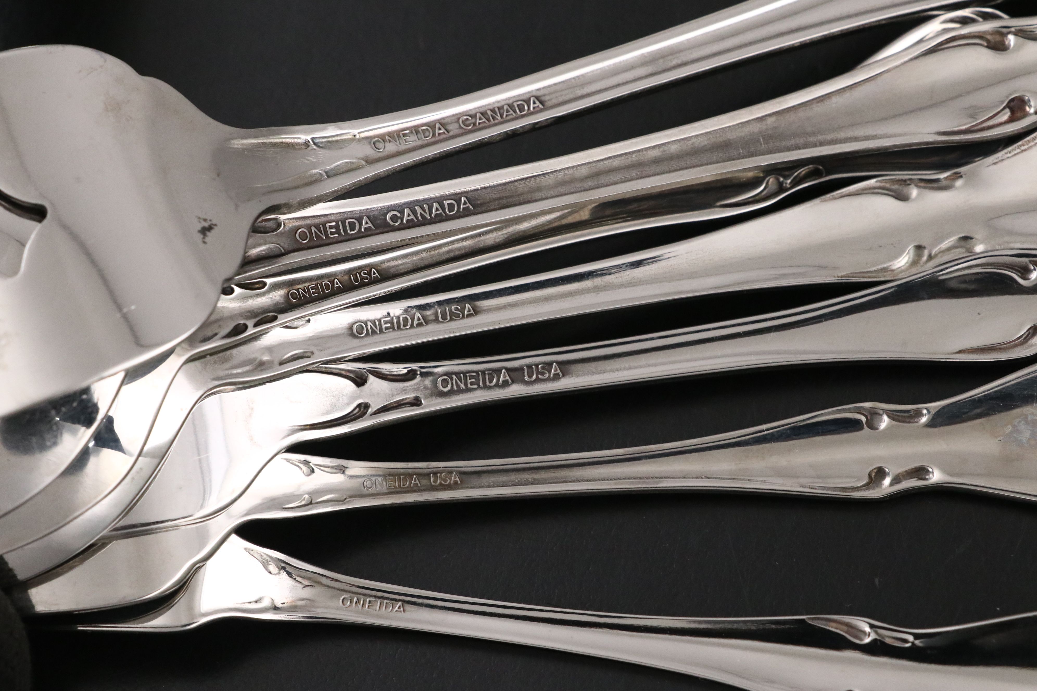 Oneida "Arbor Rose-True Rose" Stainless Steel Flatware, Late 20th Century