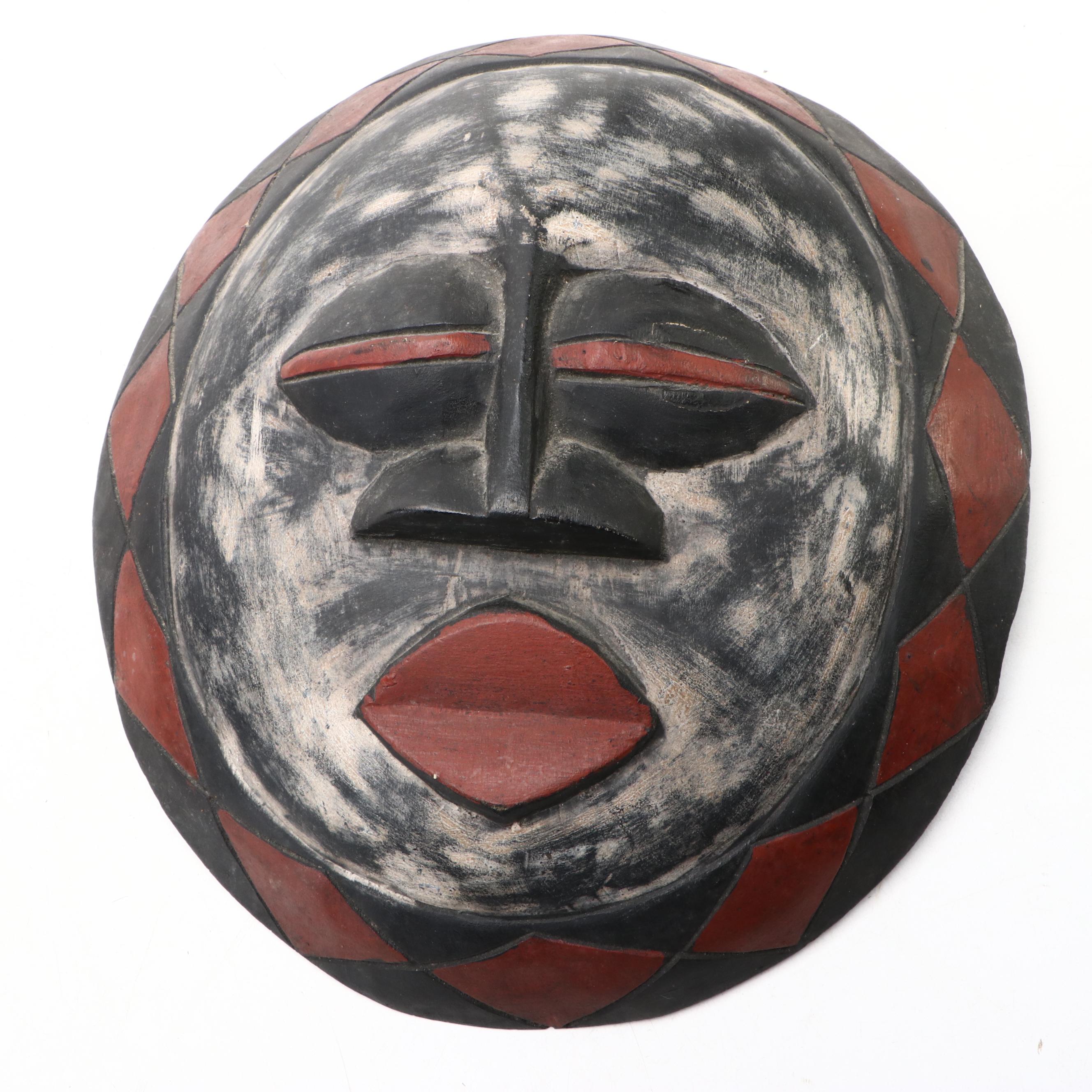 Polychrome Round and Long Carved Wooden Wall Masks