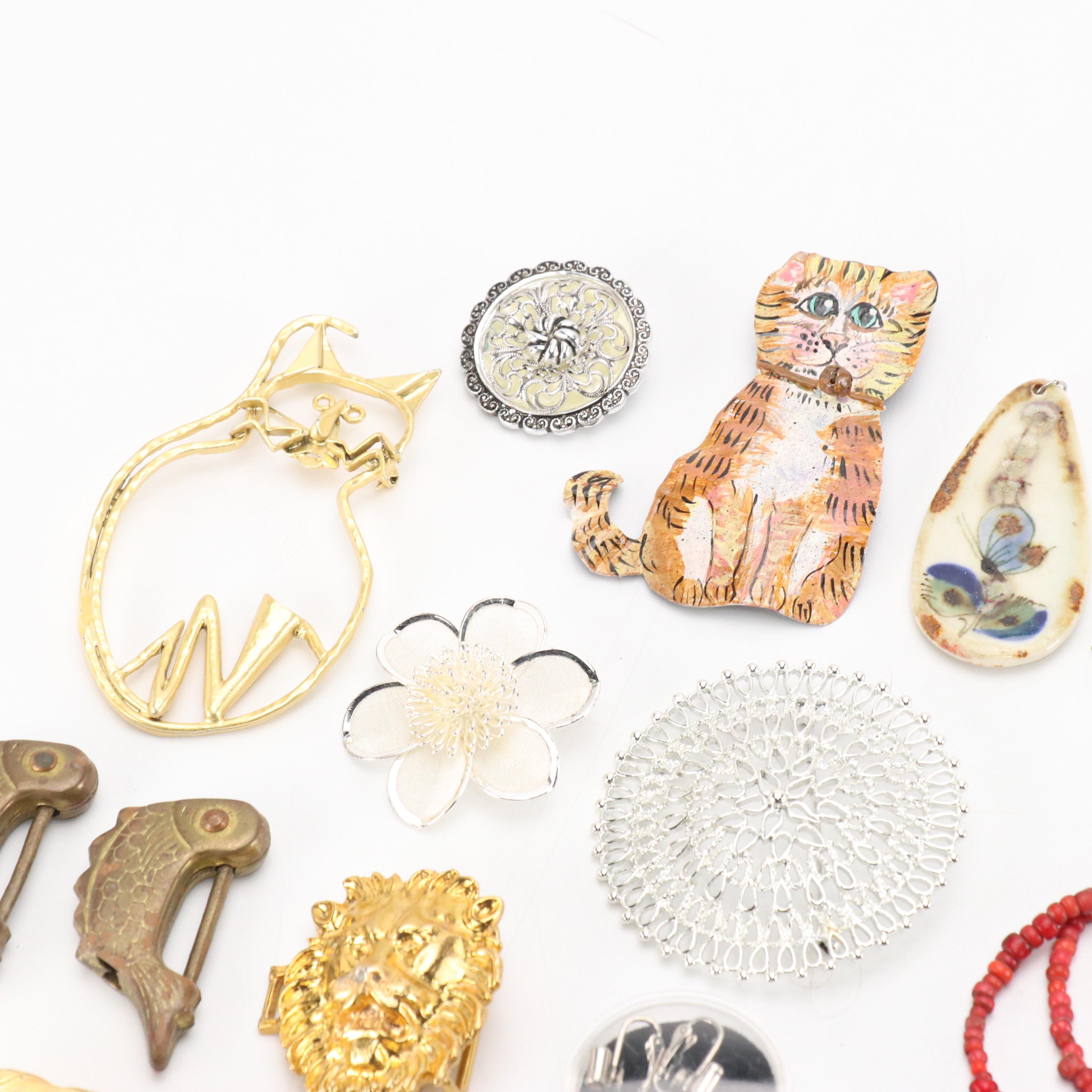 Assorted Accessories Including Necklaces, Brooches, Belt Buckles, Pendants, More