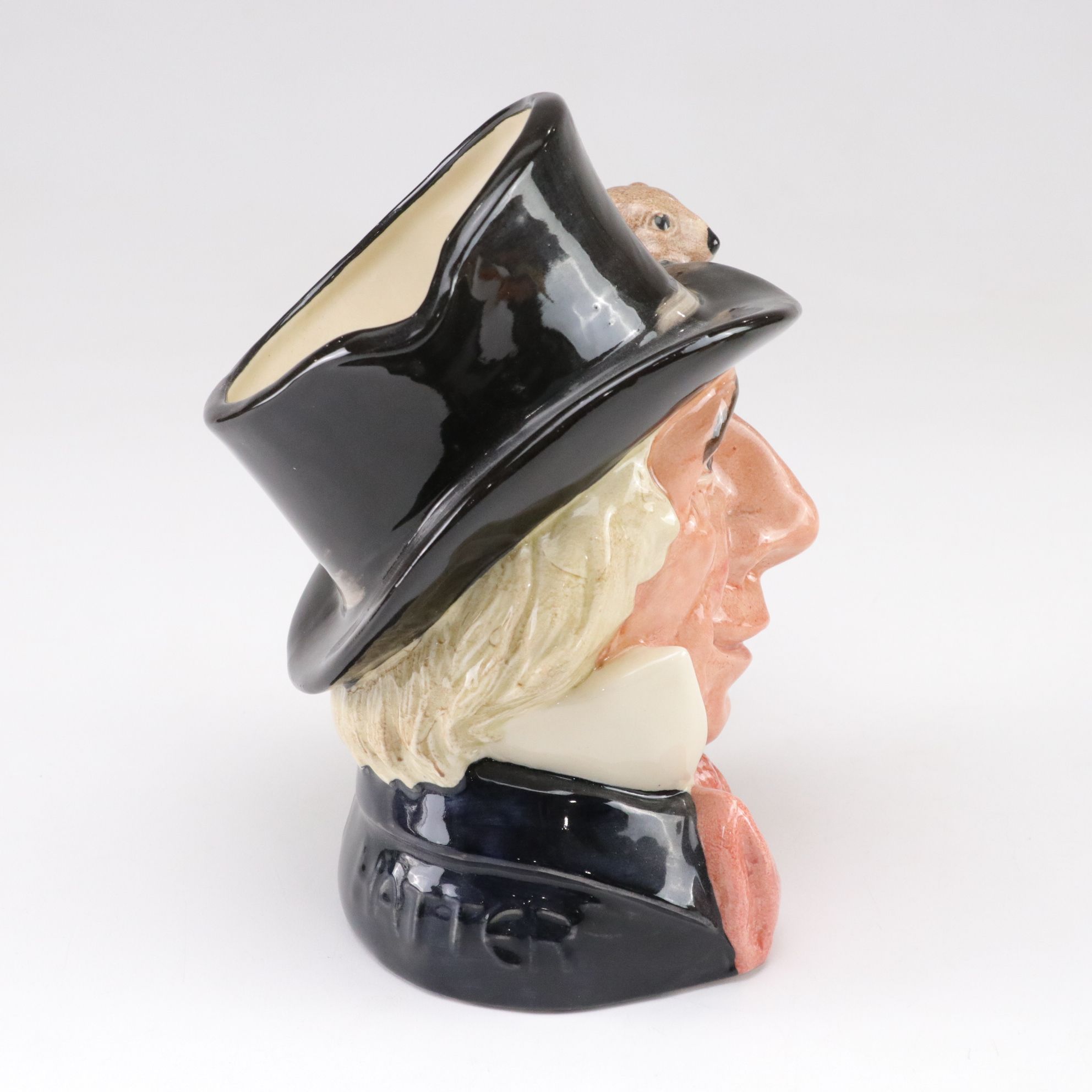 Royal Doulton Toby Jugs "The Mad Hatter", "The Red Queen", and "The Gardener"