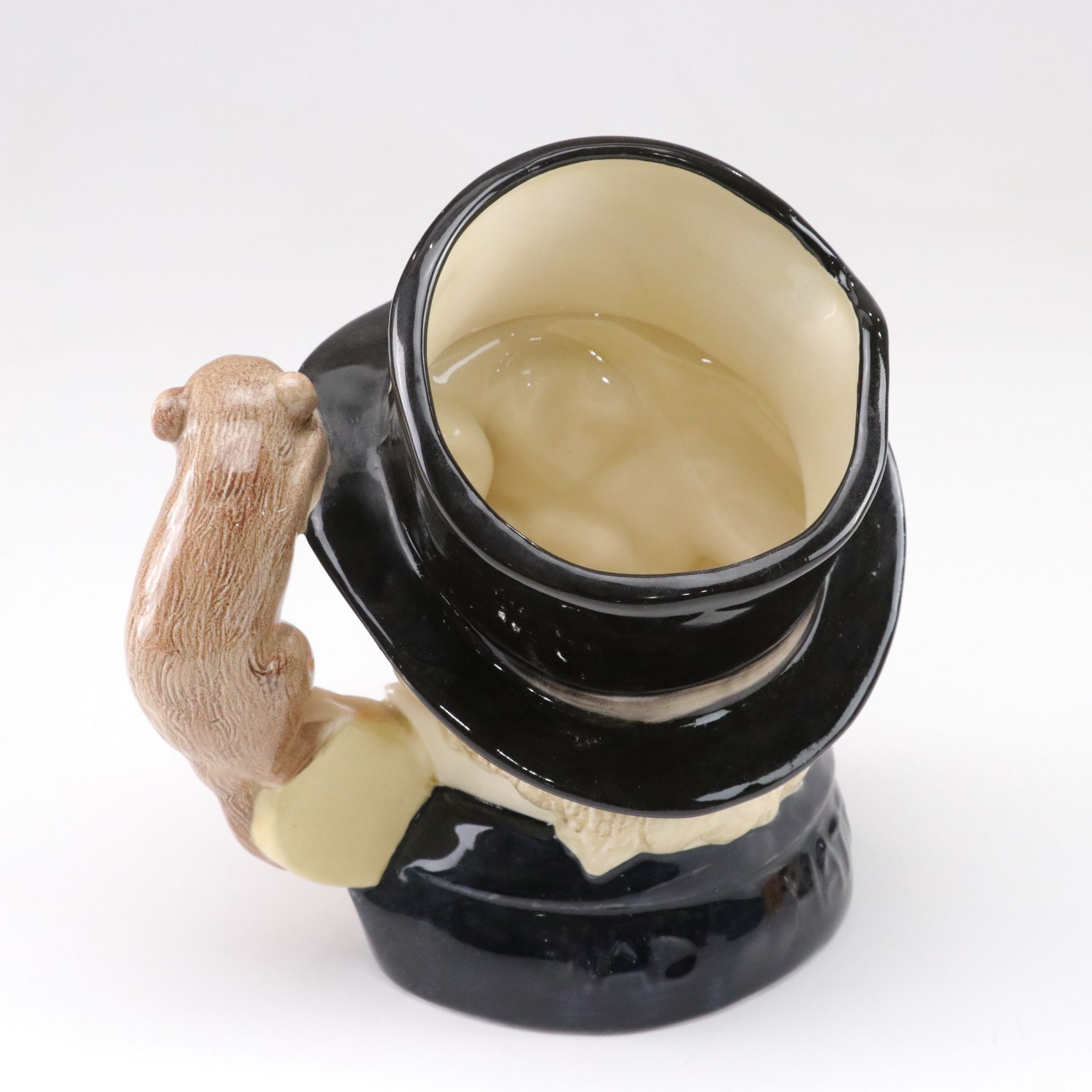 Royal Doulton Toby Jugs "The Mad Hatter", "The Red Queen", and "The Gardener"