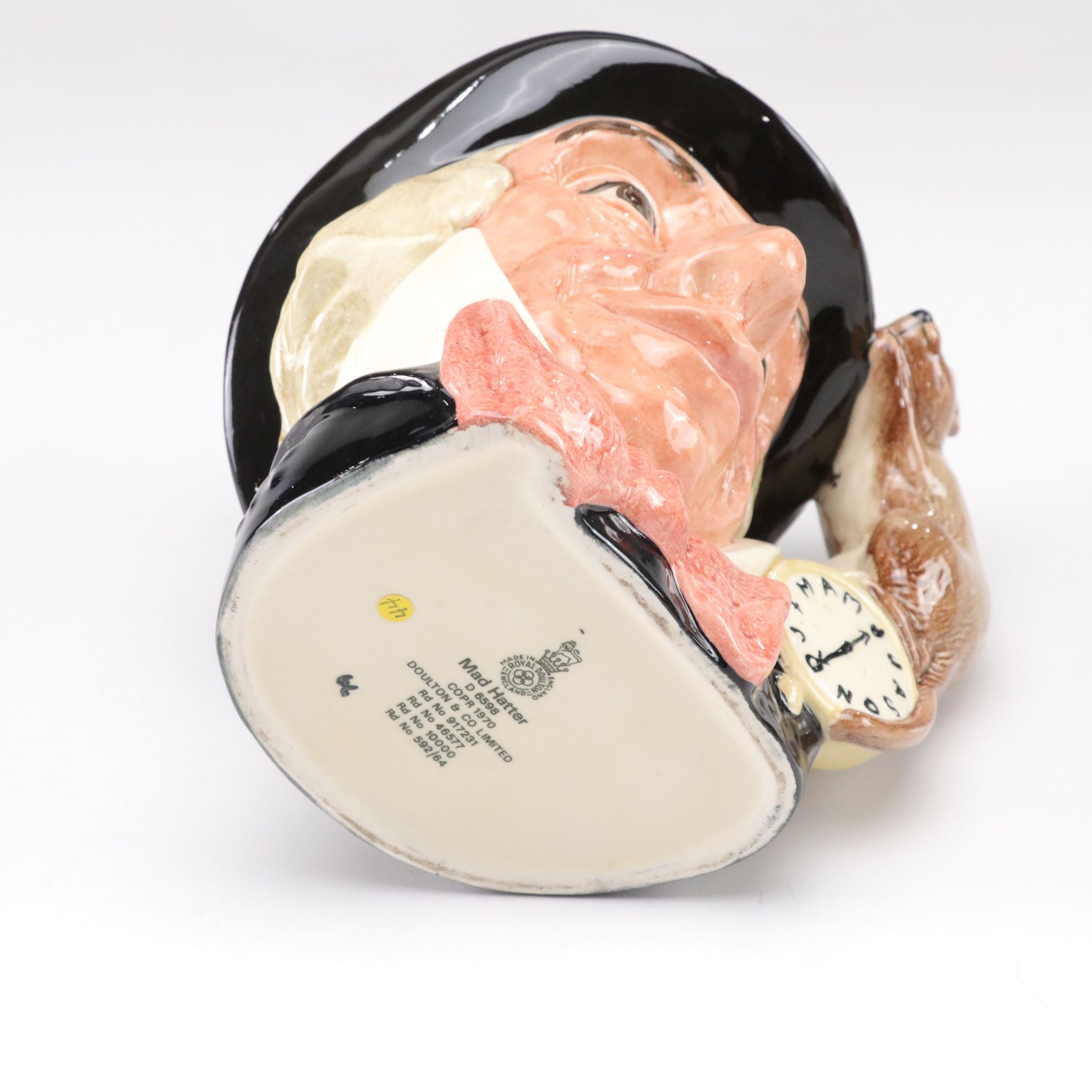 Royal Doulton Toby Jugs "The Mad Hatter", "The Red Queen", and "The Gardener"