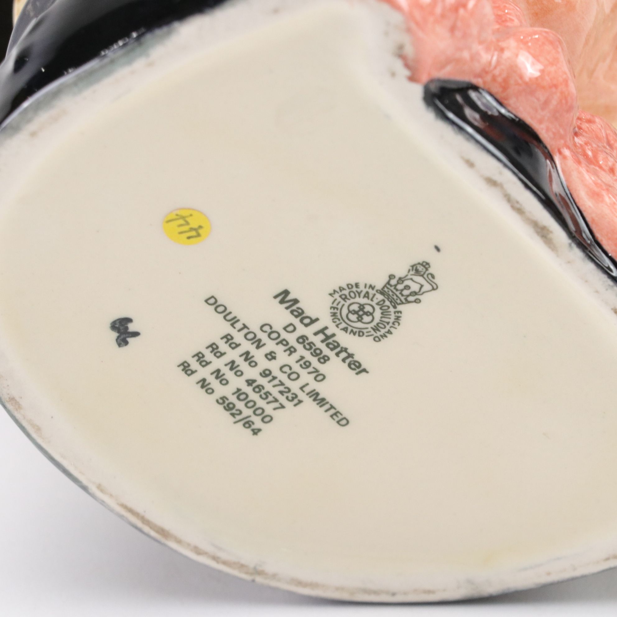 Royal Doulton Toby Jugs "The Mad Hatter", "The Red Queen", and "The Gardener"