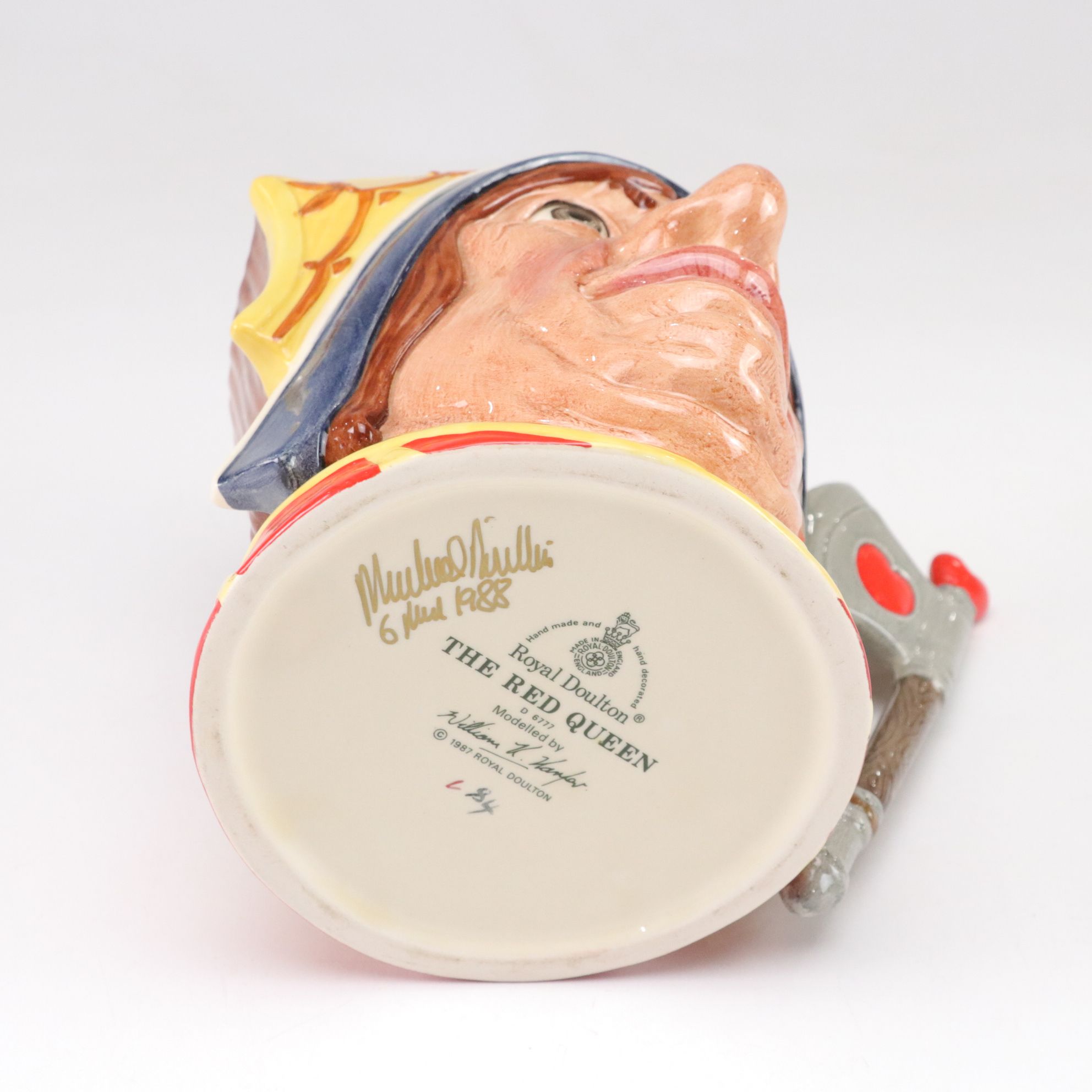 Royal Doulton Toby Jugs "The Mad Hatter", "The Red Queen", and "The Gardener"