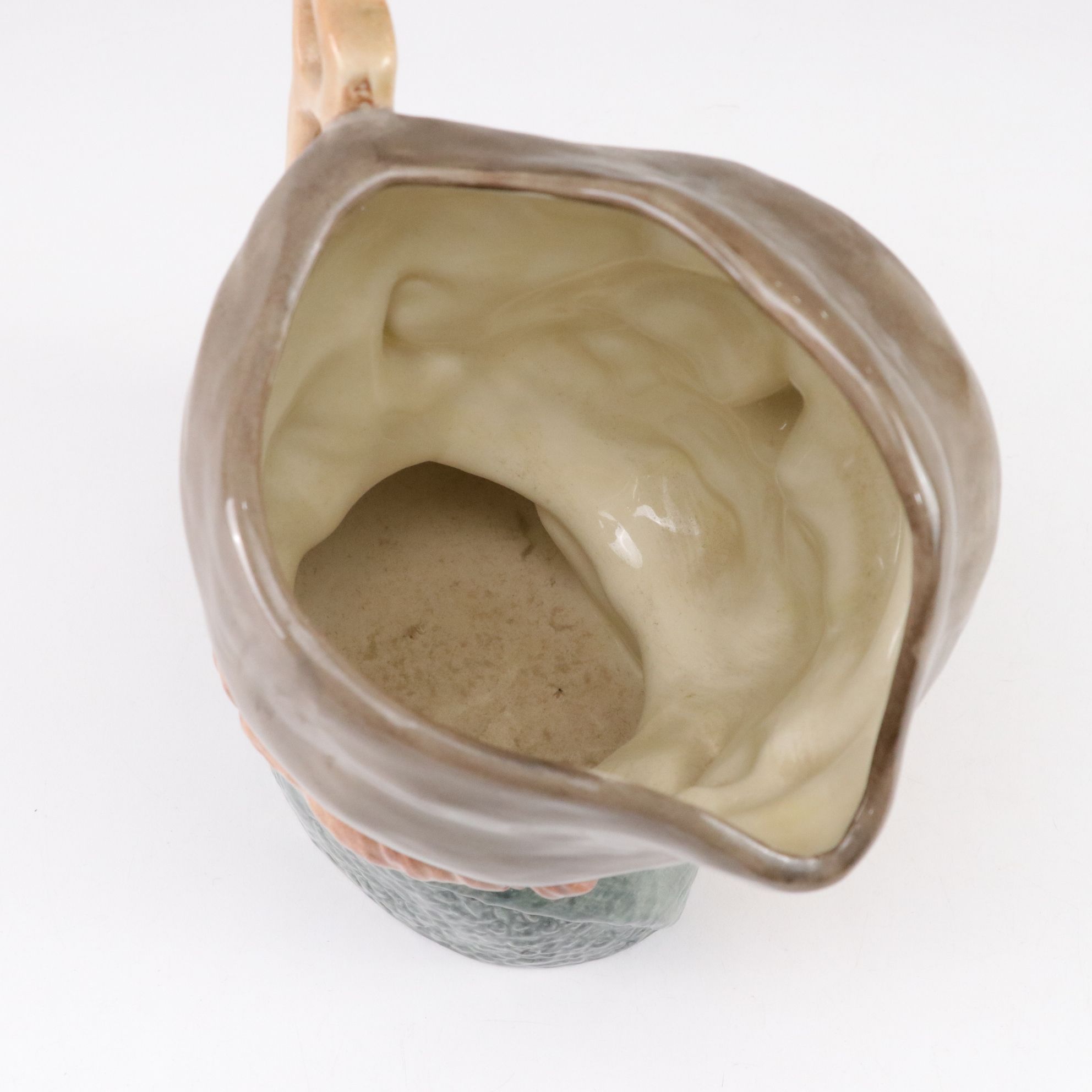 Royal Doulton Toby Jugs "The Mad Hatter", "The Red Queen", and "The Gardener"