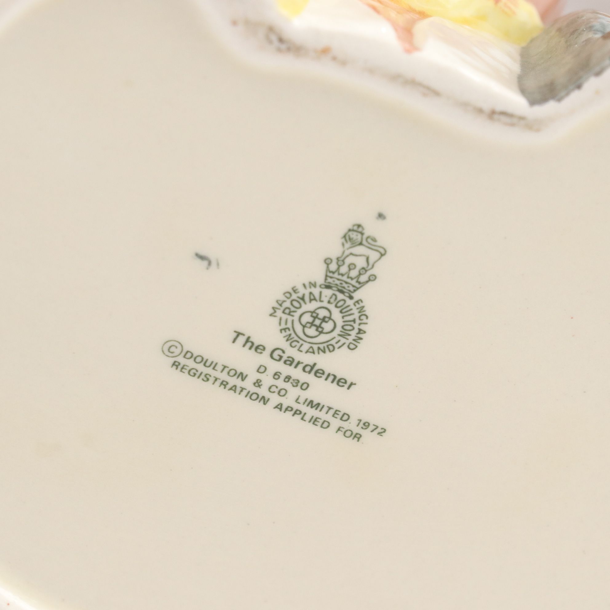 Royal Doulton Toby Jugs "The Mad Hatter", "The Red Queen", and "The Gardener"