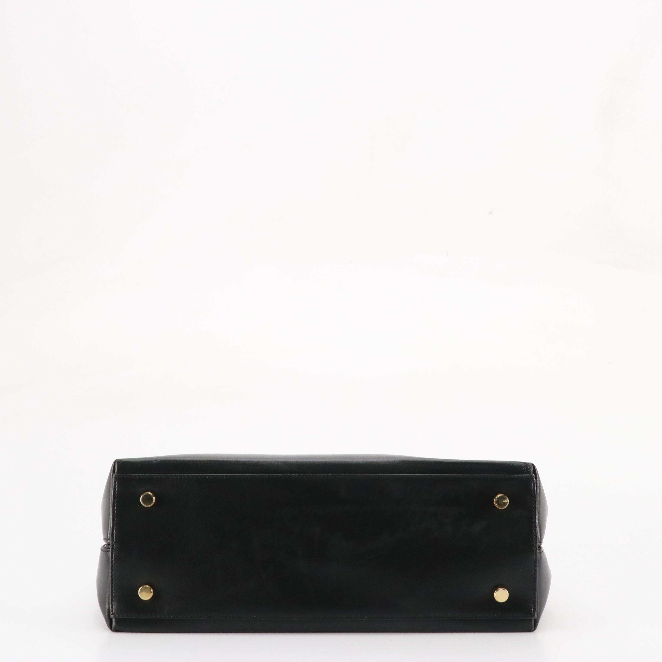 Salvatore Ferragamo Gancini Top Handle Two-Way Bag in Black Leather