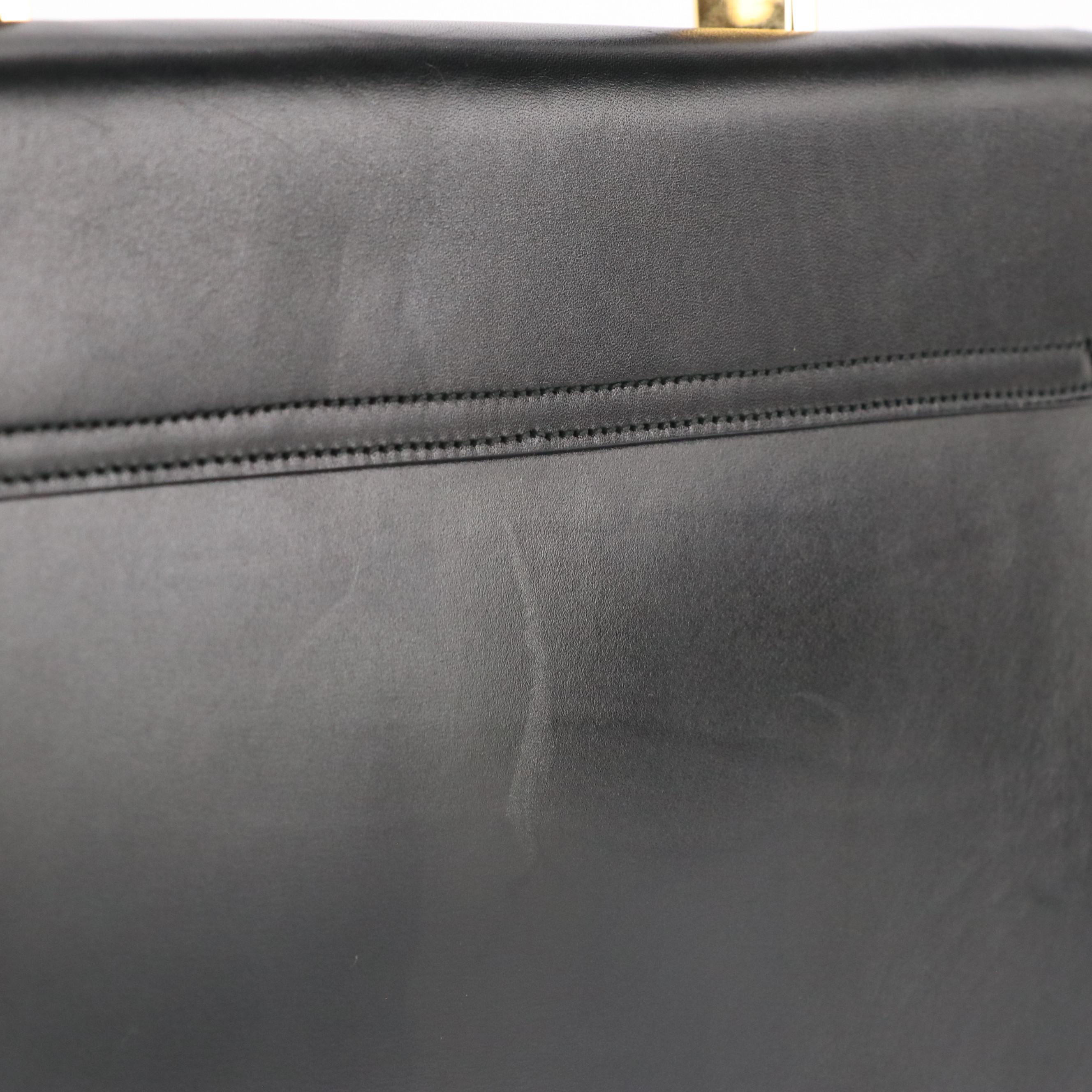 Salvatore Ferragamo Gancini Top Handle Two-Way Bag in Black Leather
