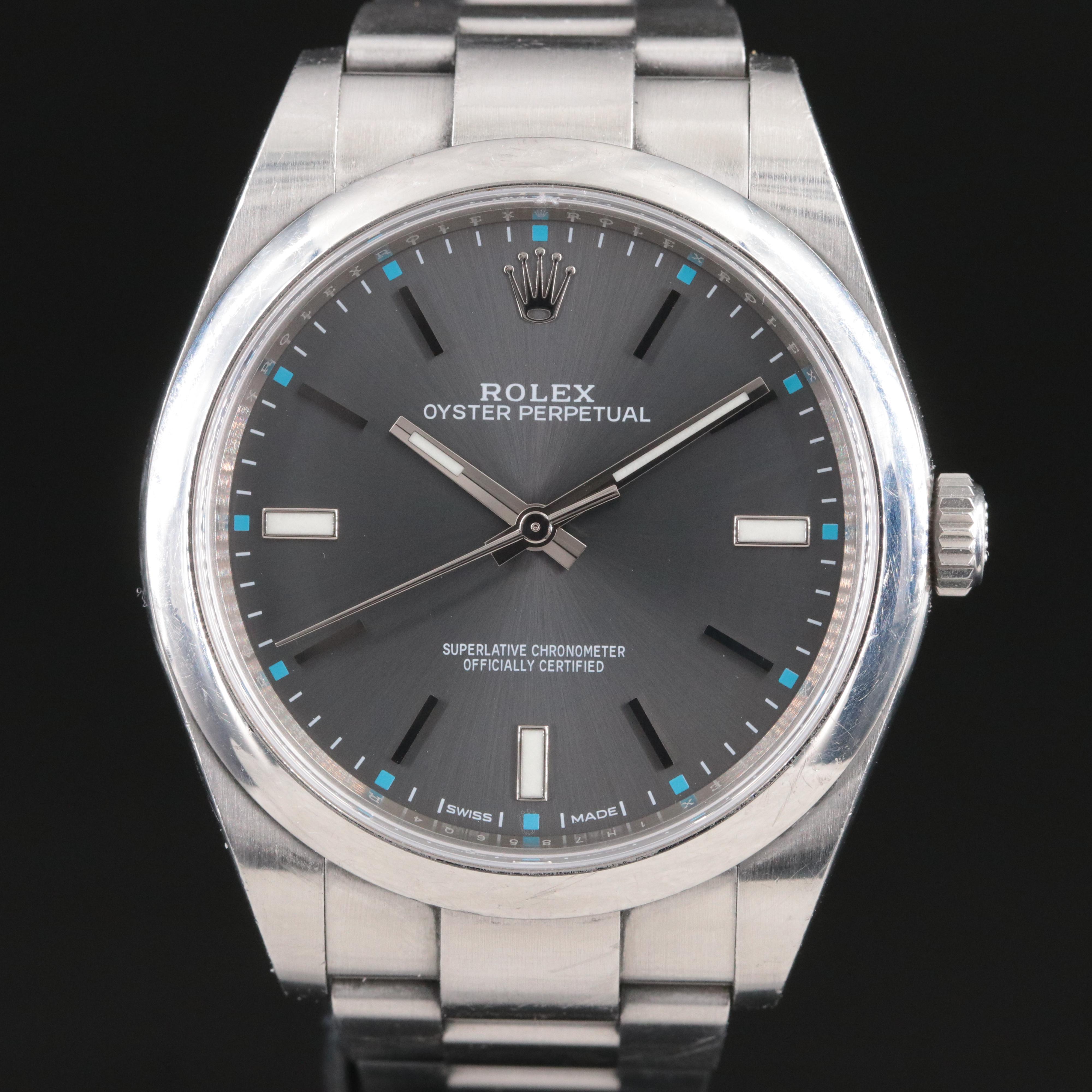 Rolex Oyster Perpetual 39mm Dark Grey Dial Light Blue Hour Dots Watch