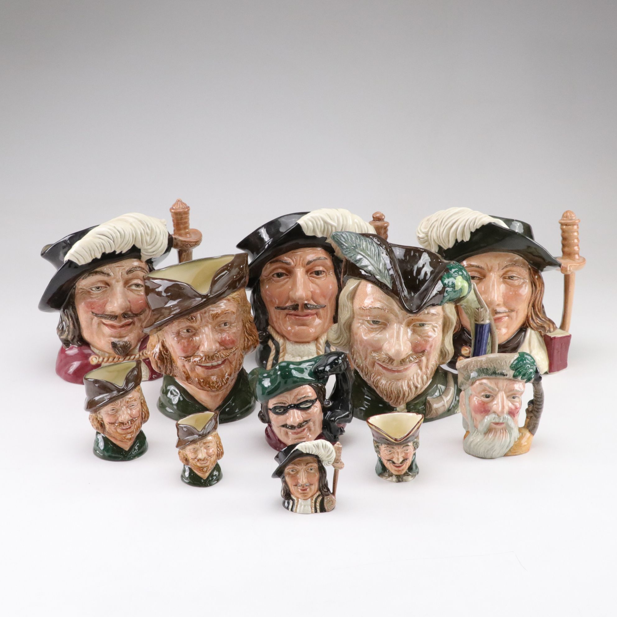 Royal Doulton Character Jugs Including "Robin Hood" and "The Three Musketeers"