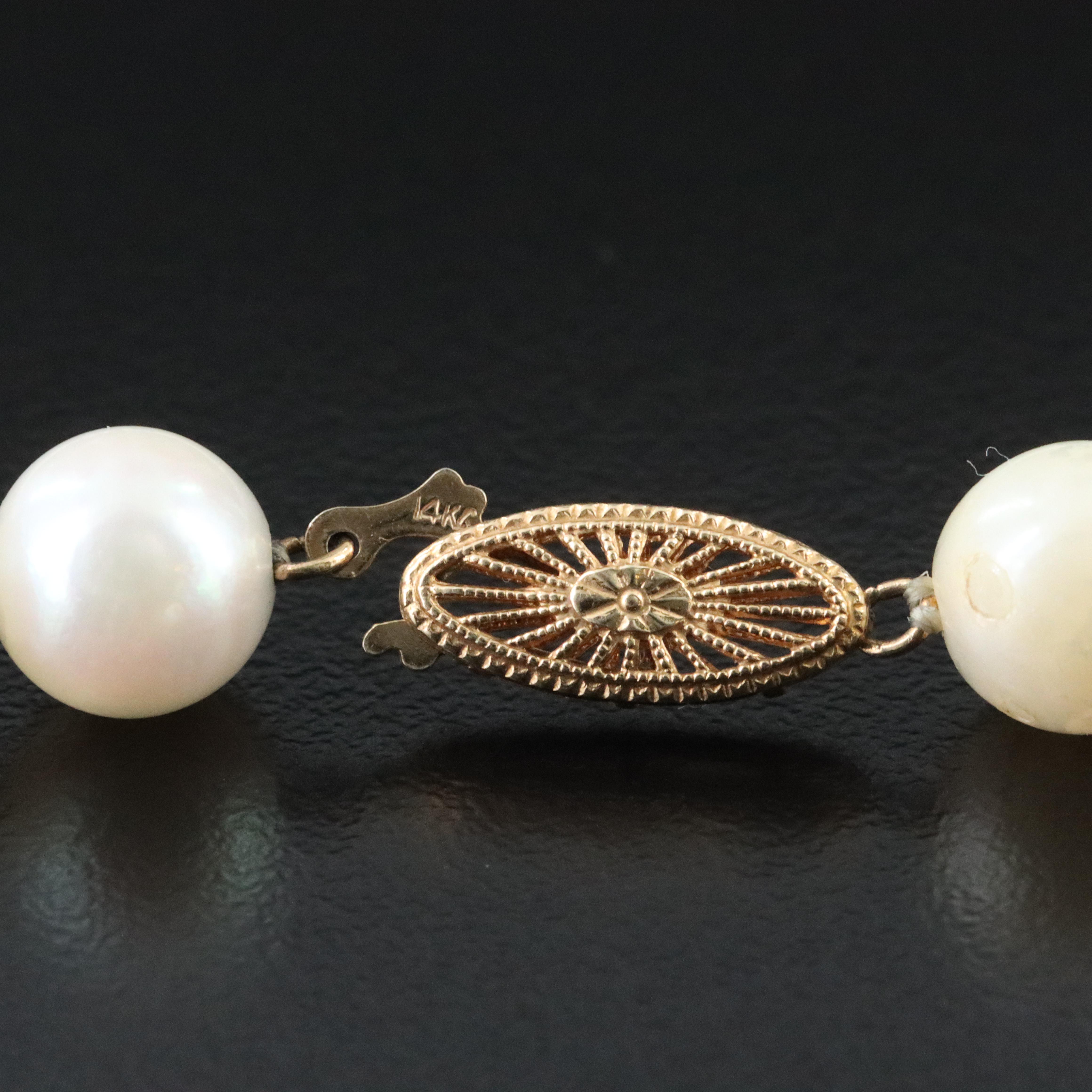 Strand of Pearls with 14K Clasp