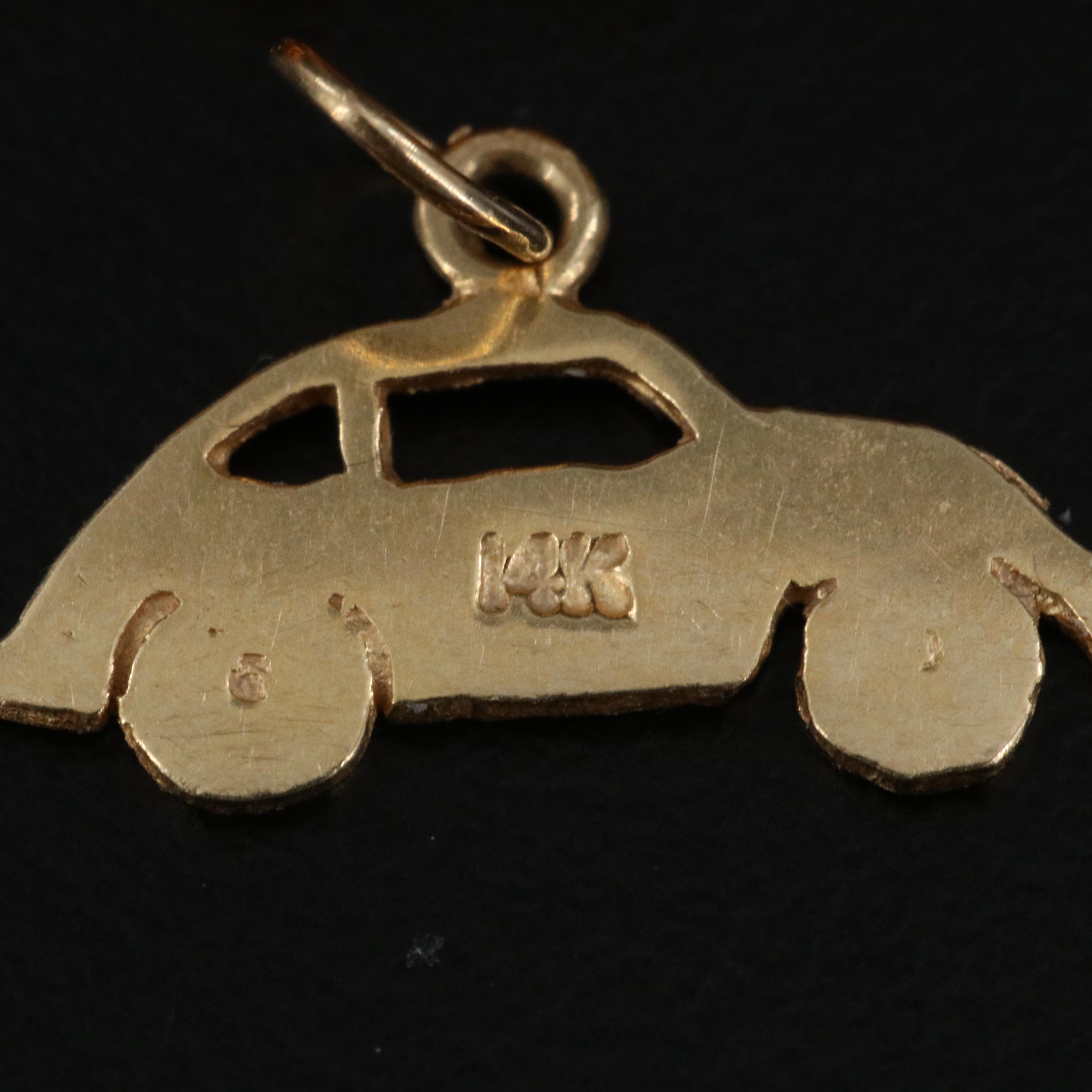 English 9K Canterbury, England and 14K Car Travel Charm Pendants