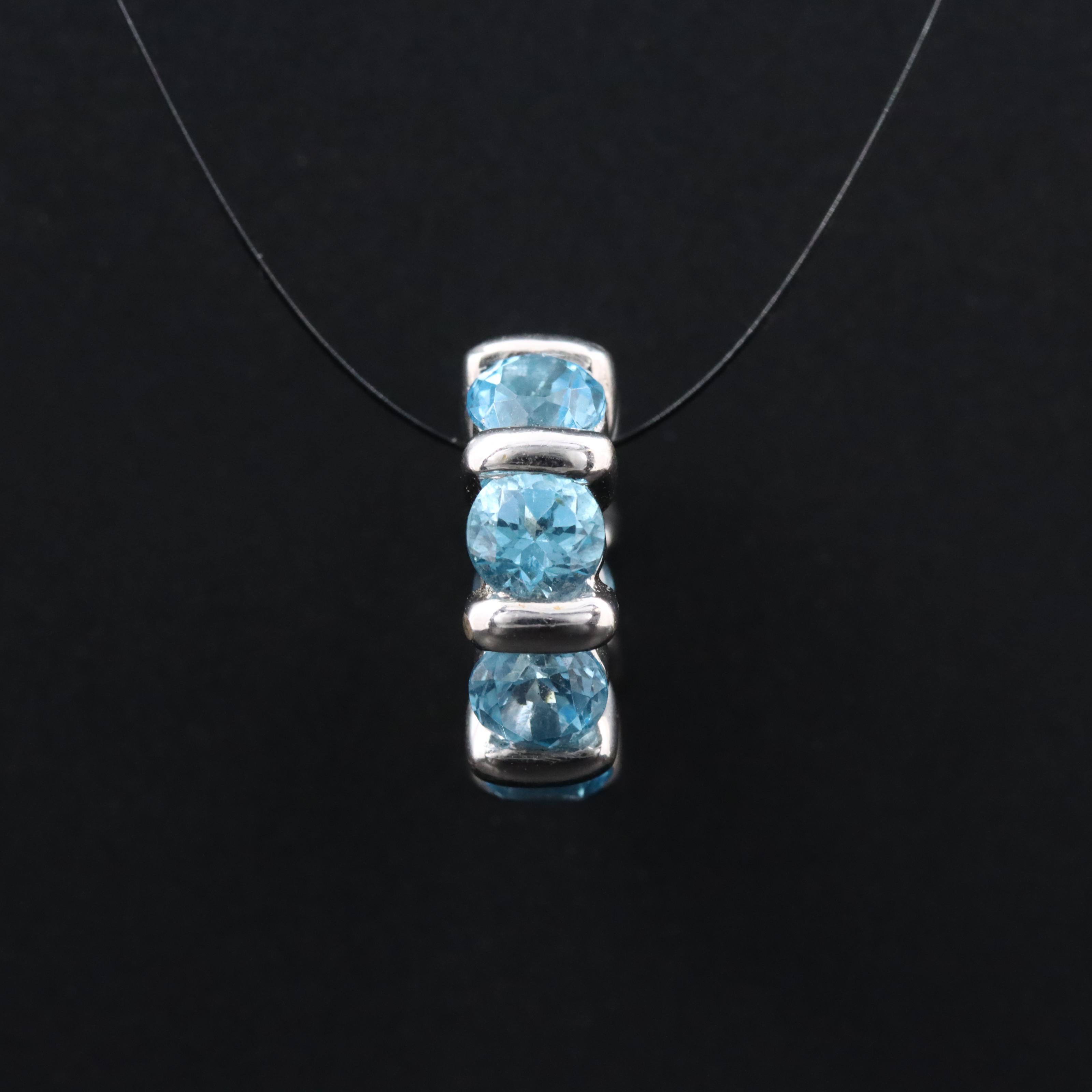 18K Swiss Blue Topaz Eternity Charm Pendant