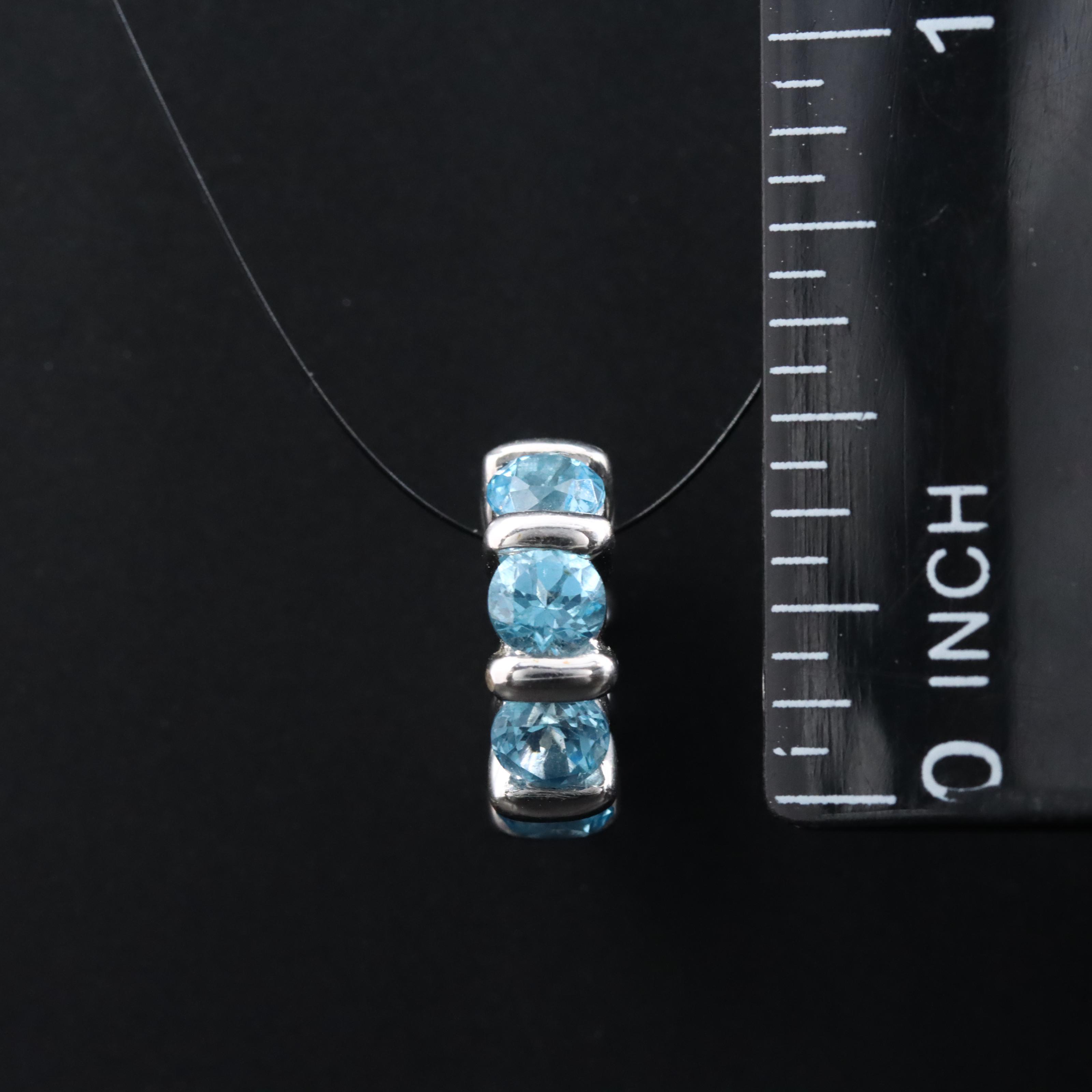 18K Swiss Blue Topaz Eternity Charm Pendant