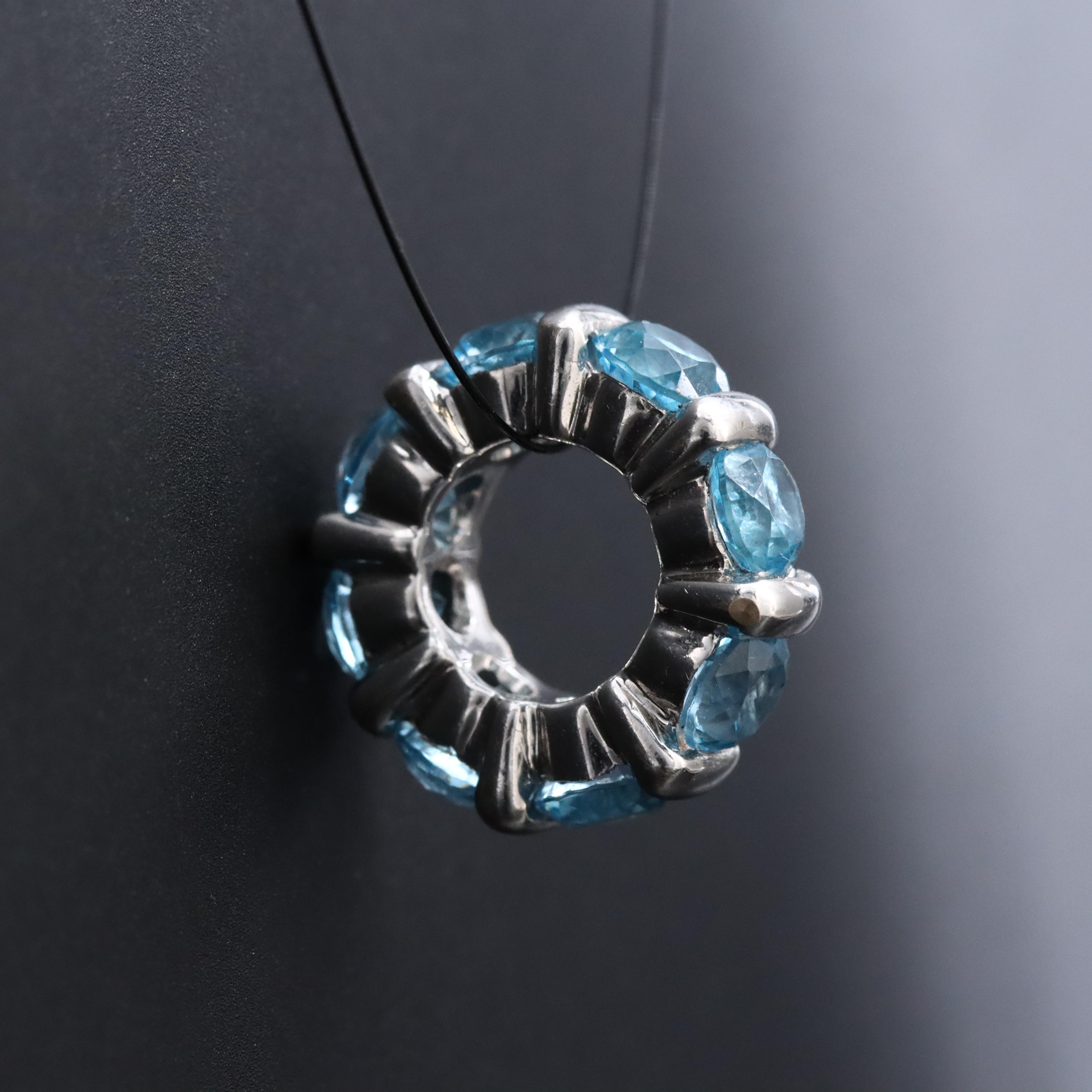 18K Swiss Blue Topaz Eternity Charm Pendant