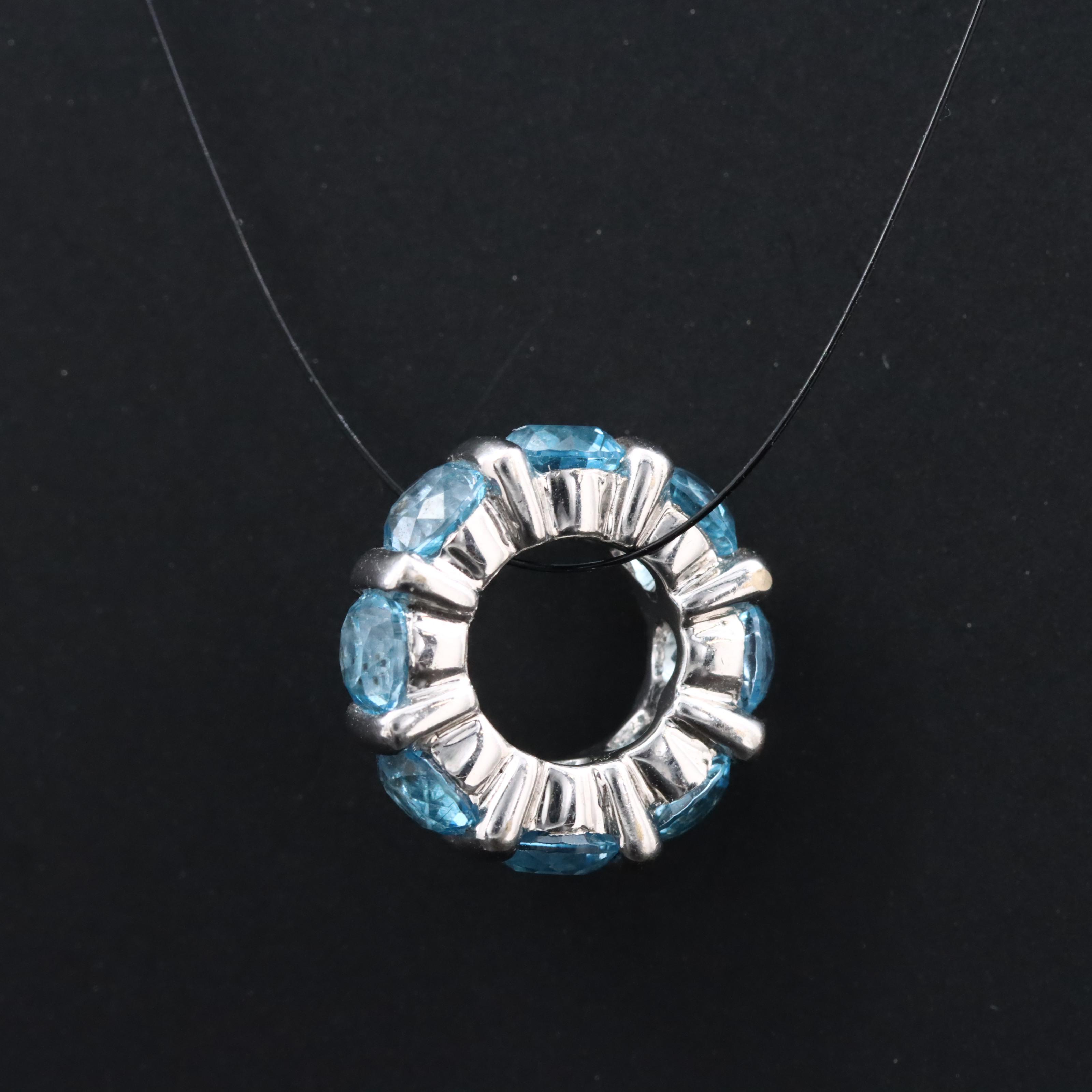 18K Swiss Blue Topaz Eternity Charm Pendant