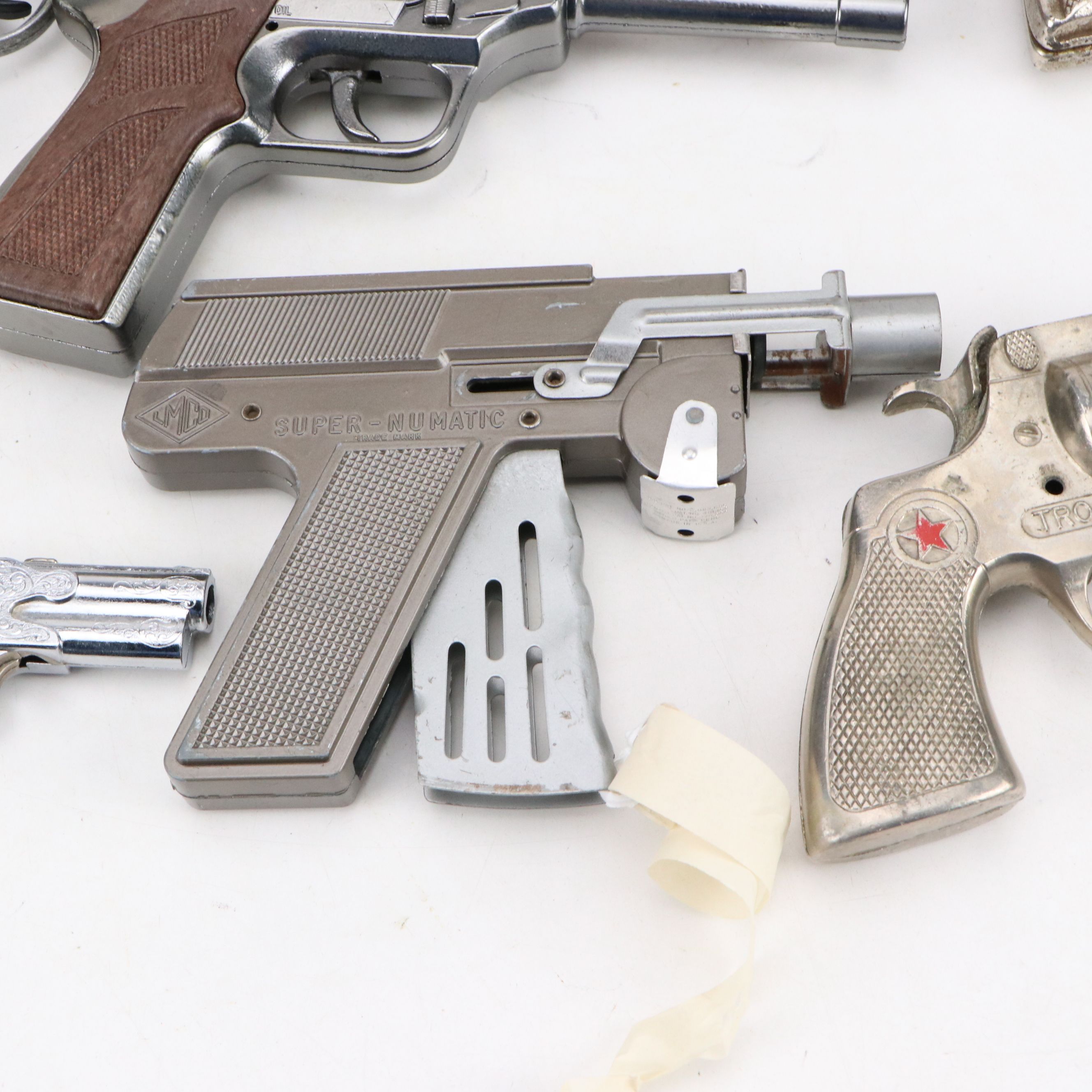 Hubley Padlock Cap Gun with Wild West Coin Bank and More Vintage Toy Guns