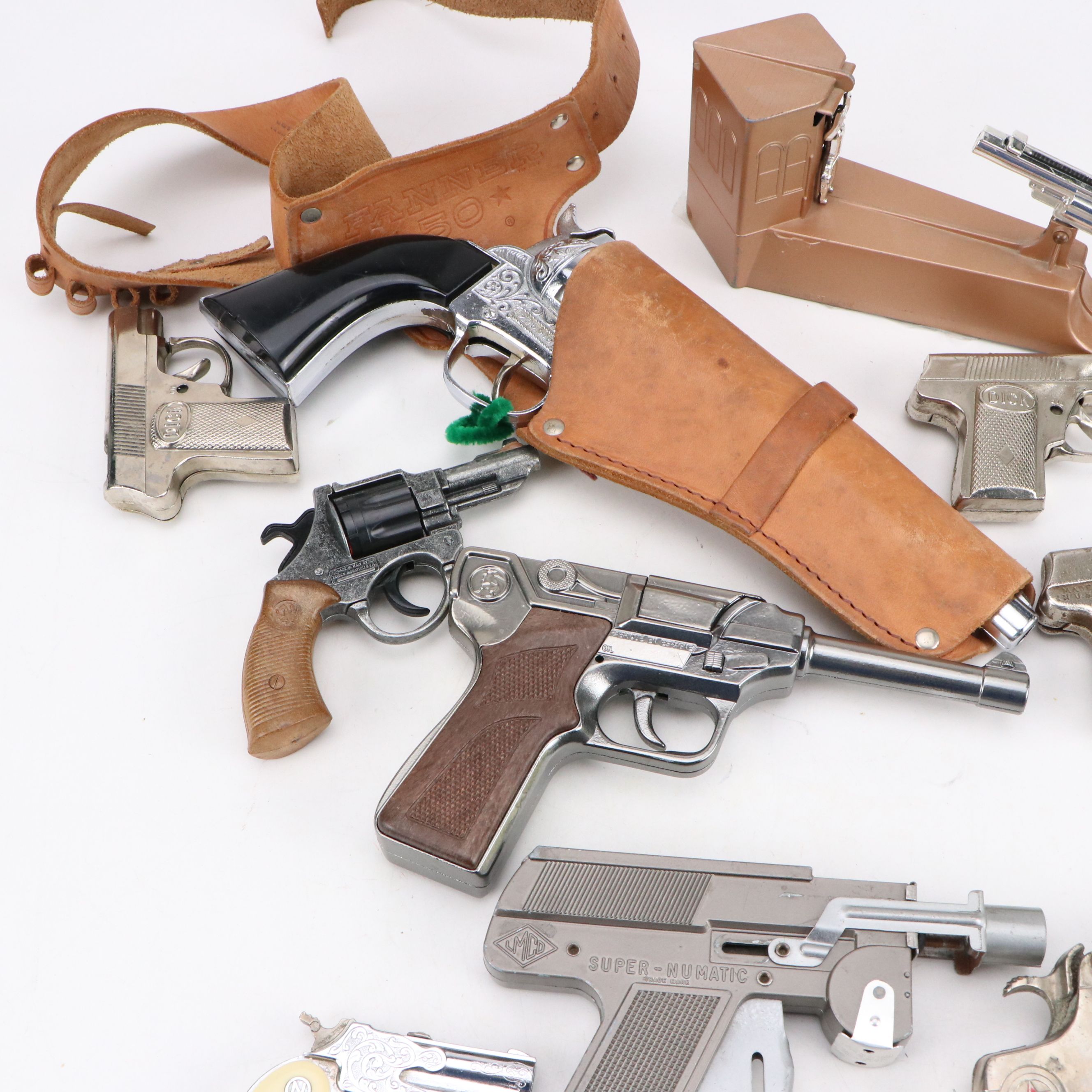 Hubley Padlock Cap Gun with Wild West Coin Bank and More Vintage Toy Guns