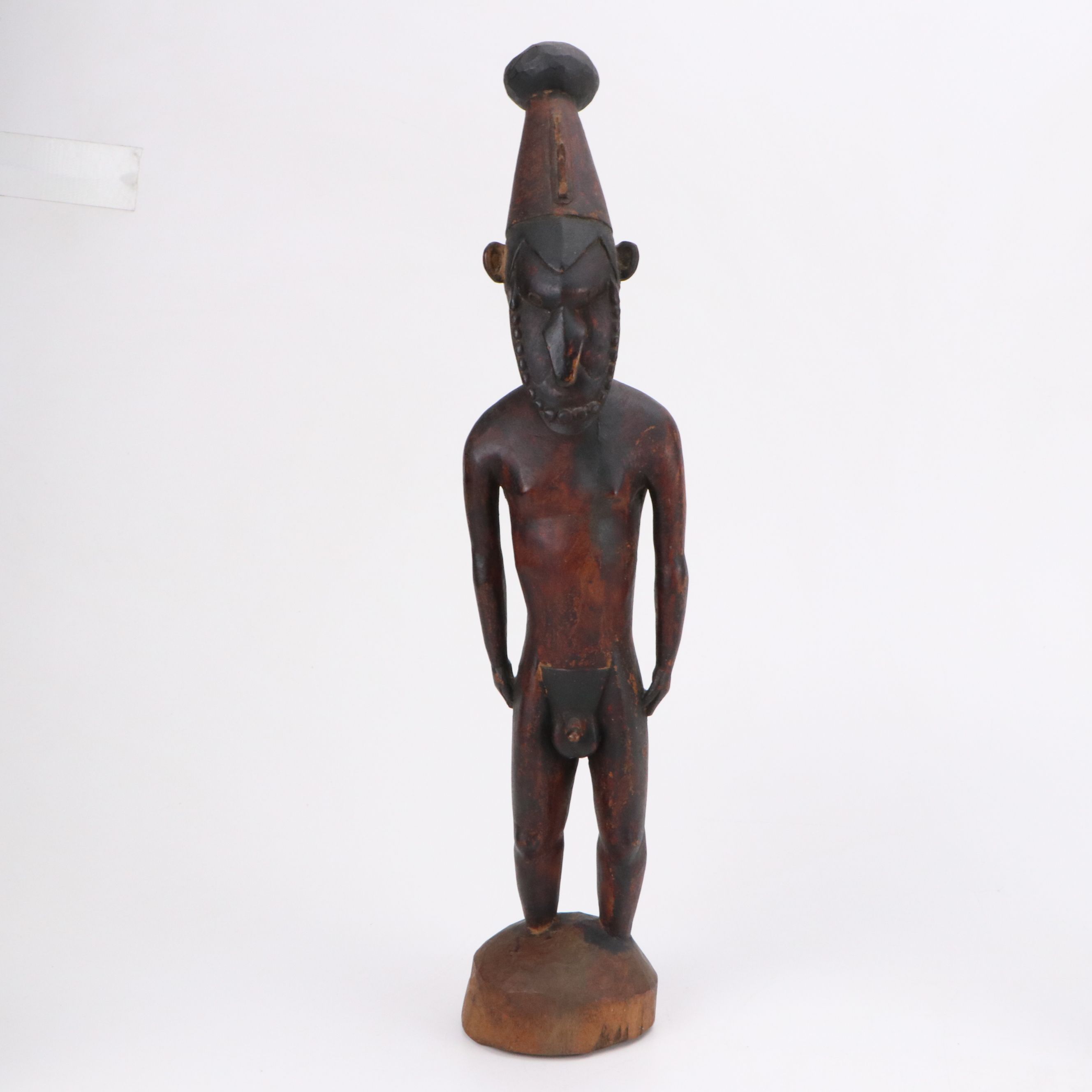 PNG Lower Sepik Carved Masks with Woven Bags and Carved Male Figure