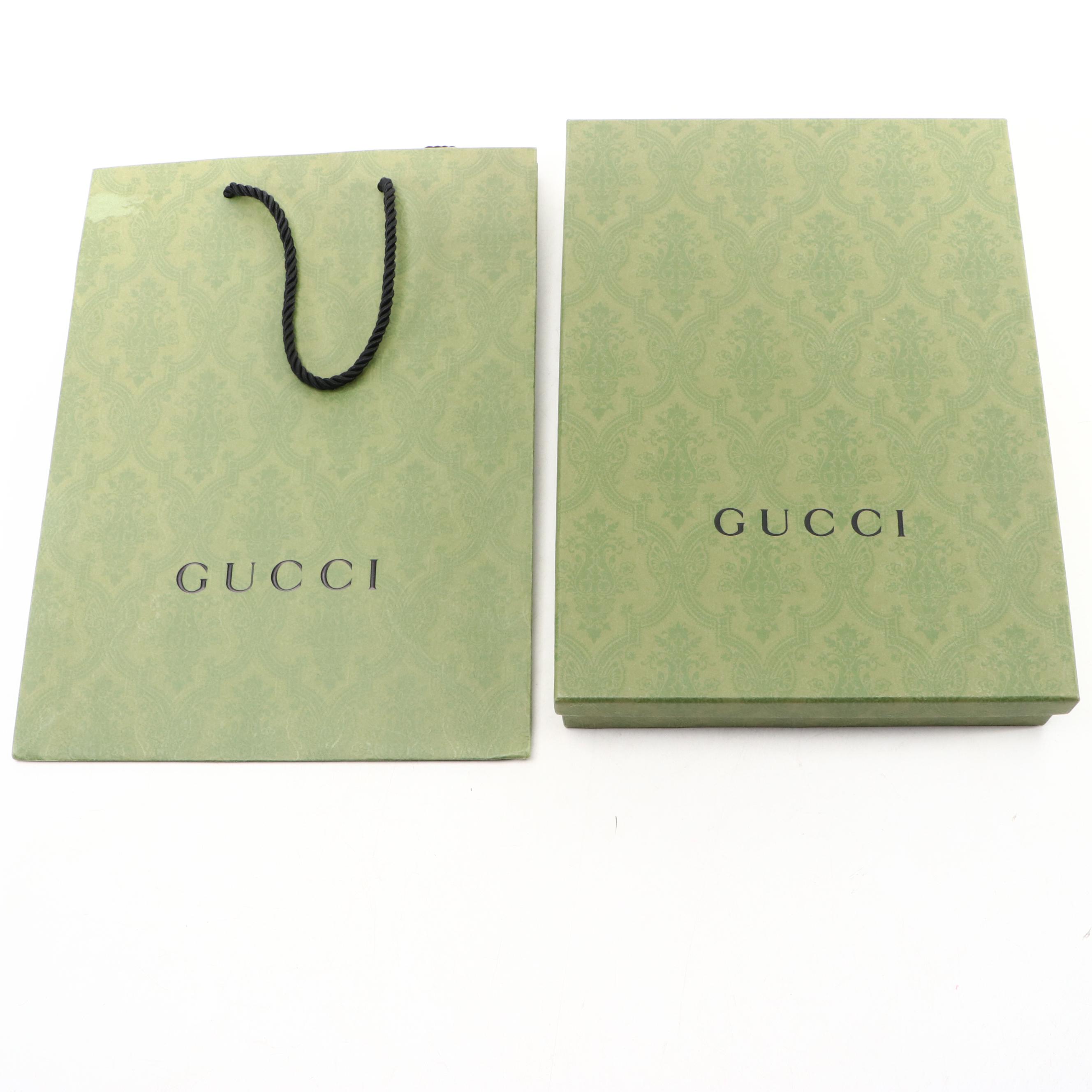 Gucci Zip Wristlet Clutch in Black Perforated GG Embossed Leather