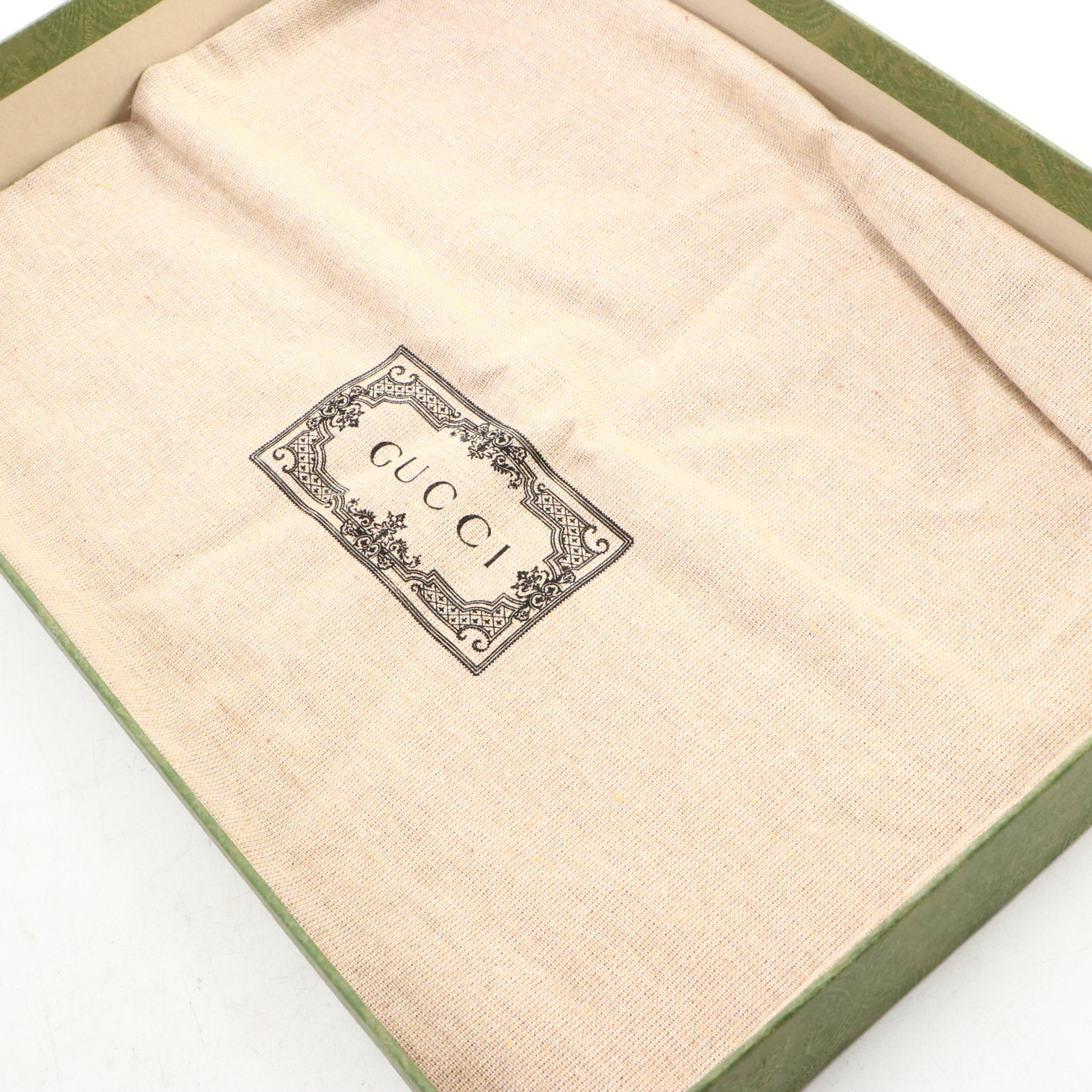 Gucci Zip Wristlet Clutch in Black Perforated GG Embossed Leather